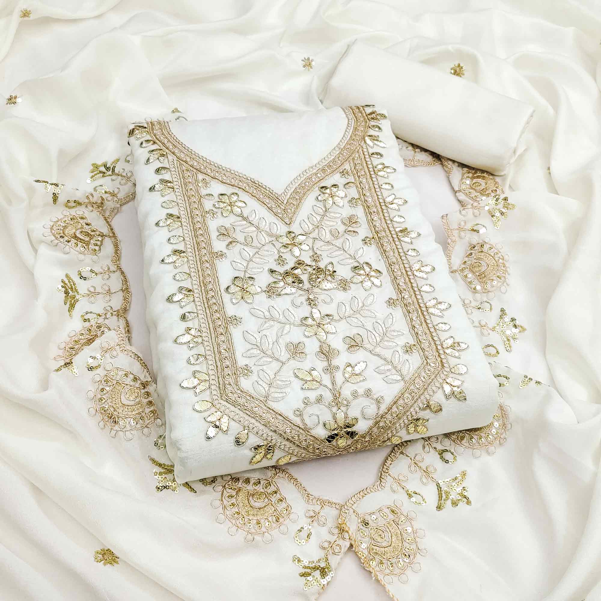 Timeless Offwhite Floral Embroidered Vichitra Silk Dress Material Highlighted With Gota Patti Work