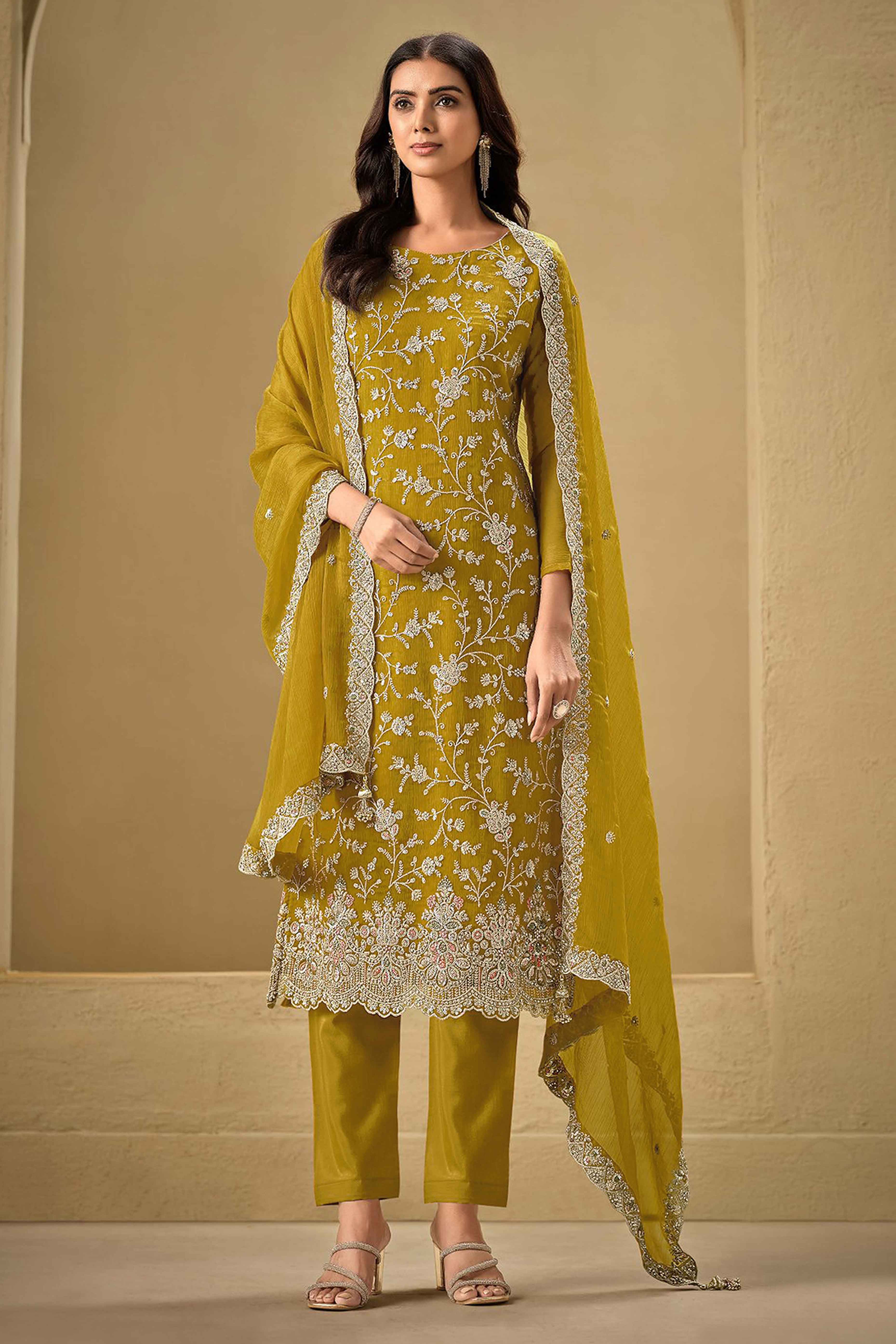 Embroidered Mustard Semi Stitched Suit With A Touch of Sequin & Studded Zarkan Work