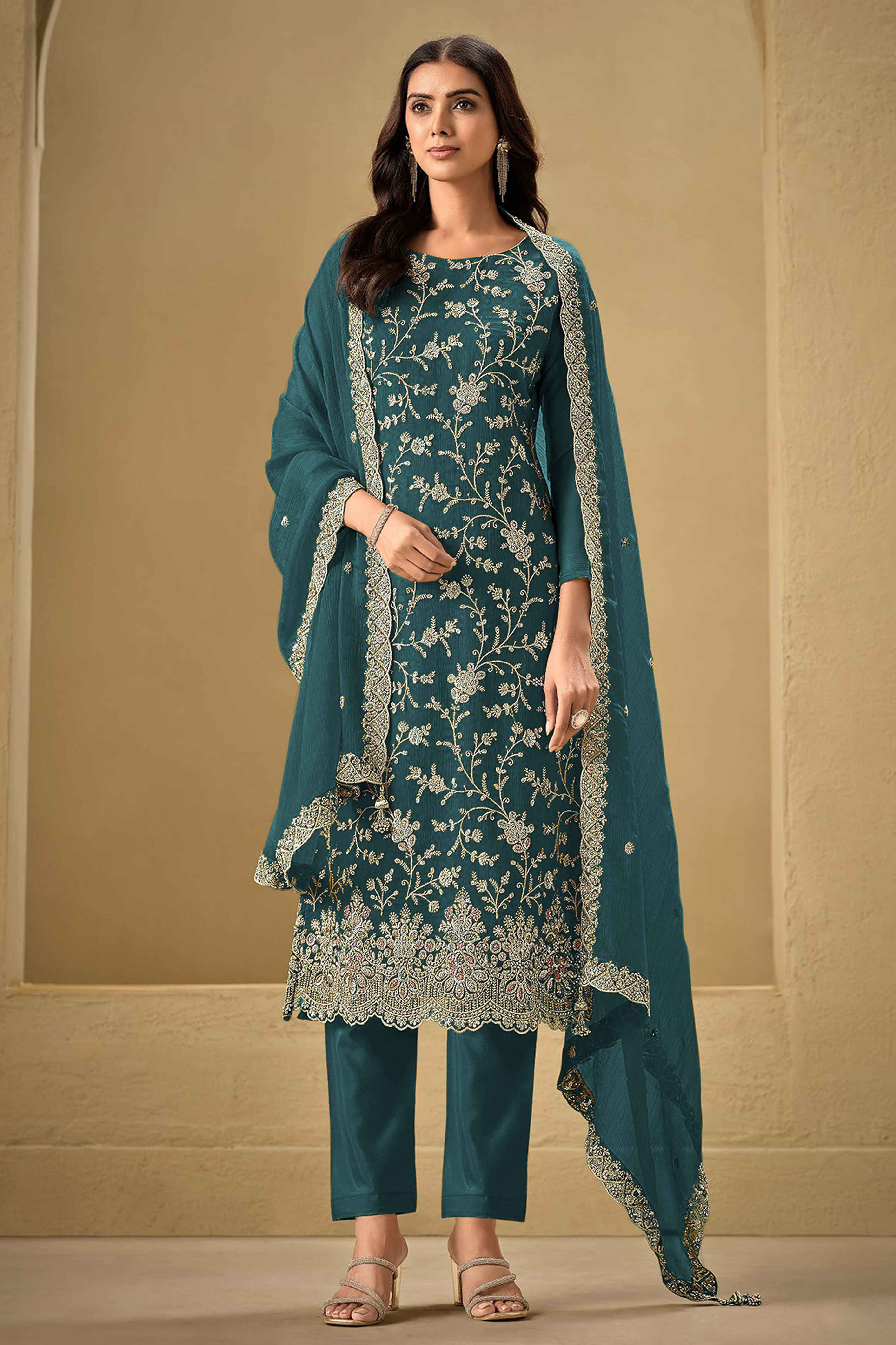 Embroidered Teal Semi Stitched Suit With A Touch of Sequin & Studded Zarkan Work