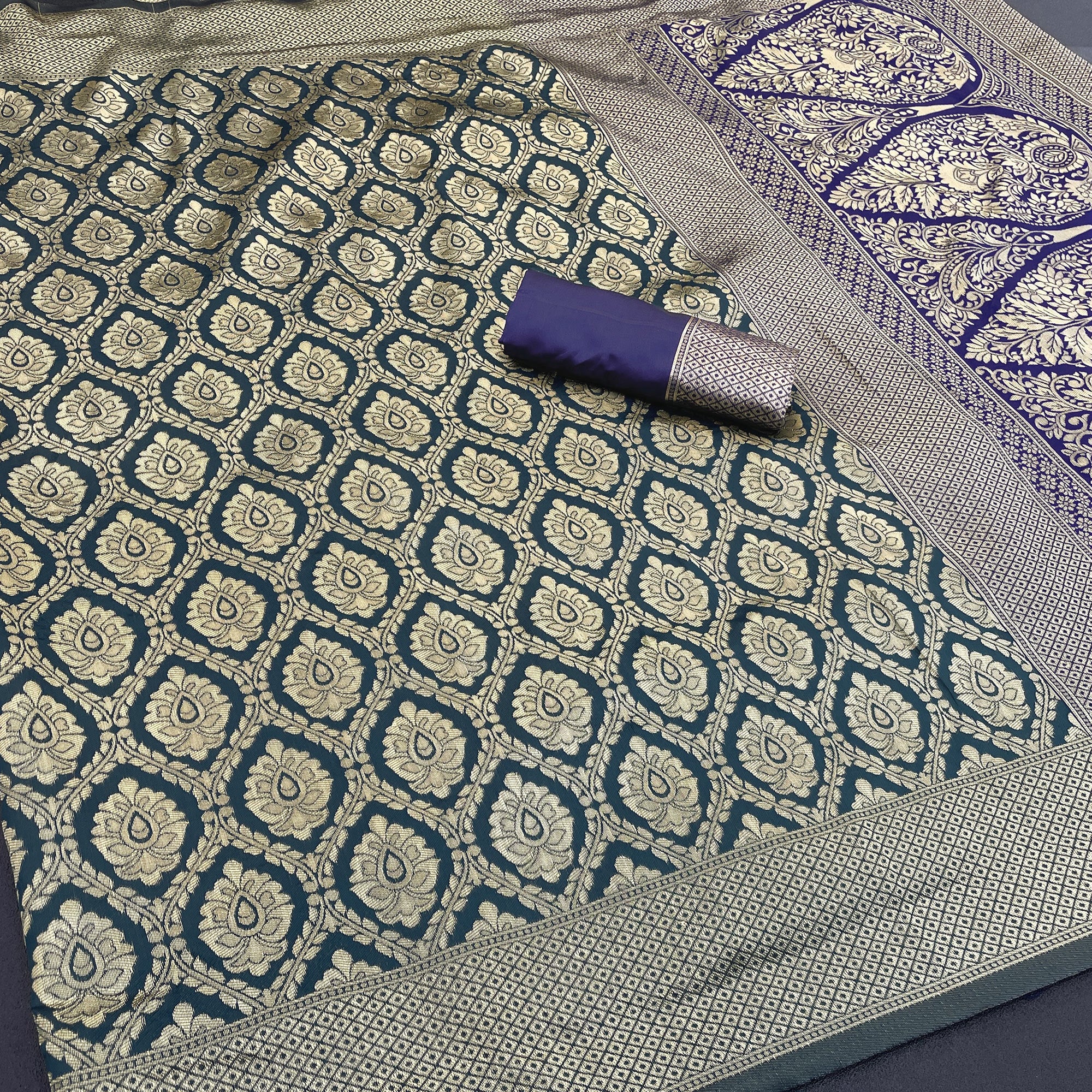 Charming Dark Teal Banarasi Silk Saree Adorned With Floral Zari Weaving