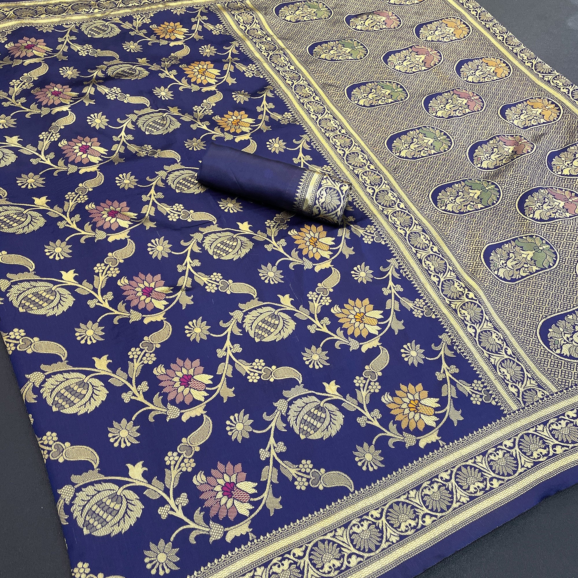 Charming Navy Blue Banarasi Silk Saree Adorned With Floral Zari Weaving