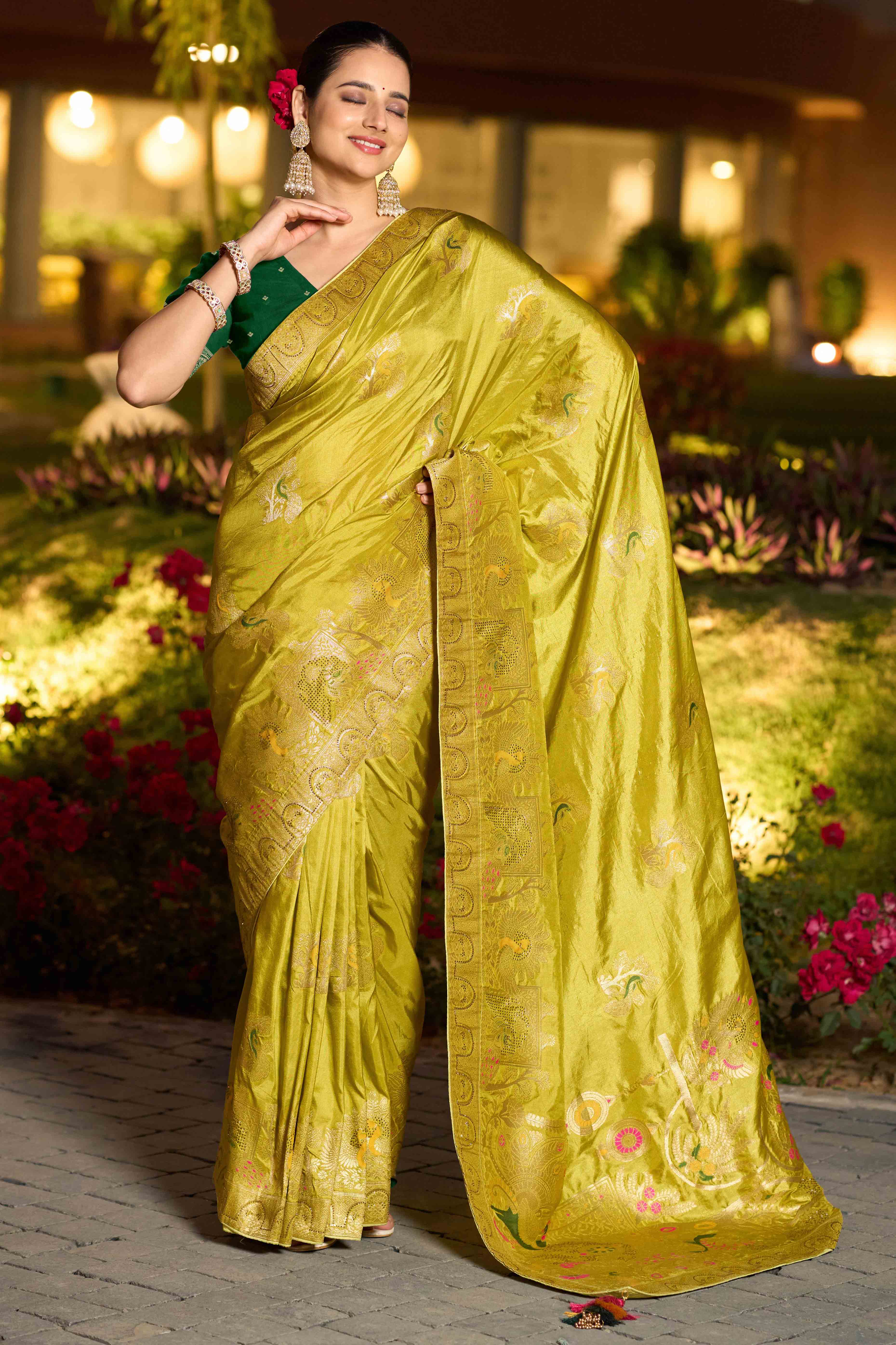 Graceful Green Dola Silk Saree With Intricate Zari Weaving & Sparkling Swarovski Accents
