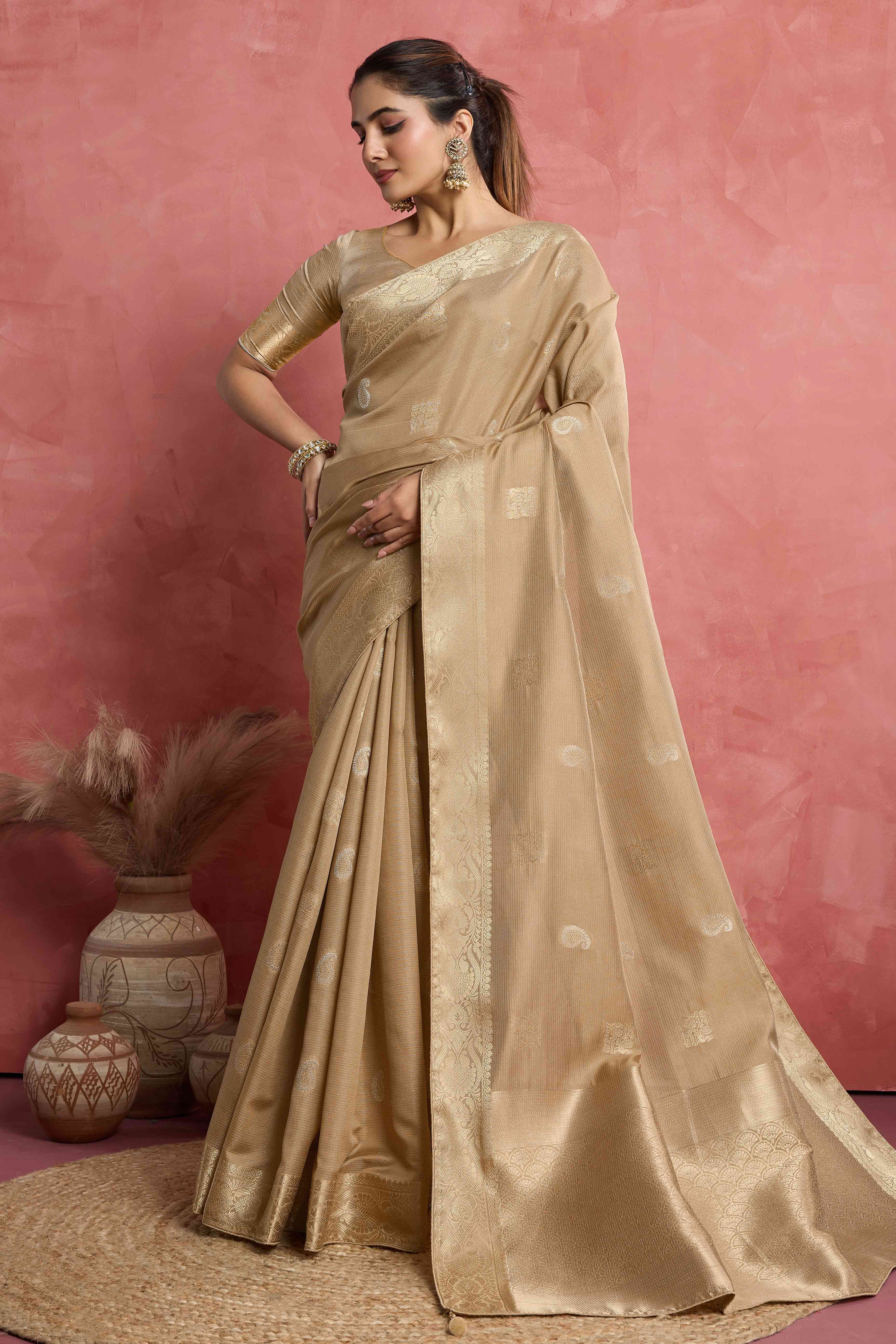 Contemporary Beige Silk Blend Saree Flaunting Alternate Butta With Piping & Tassel Accents