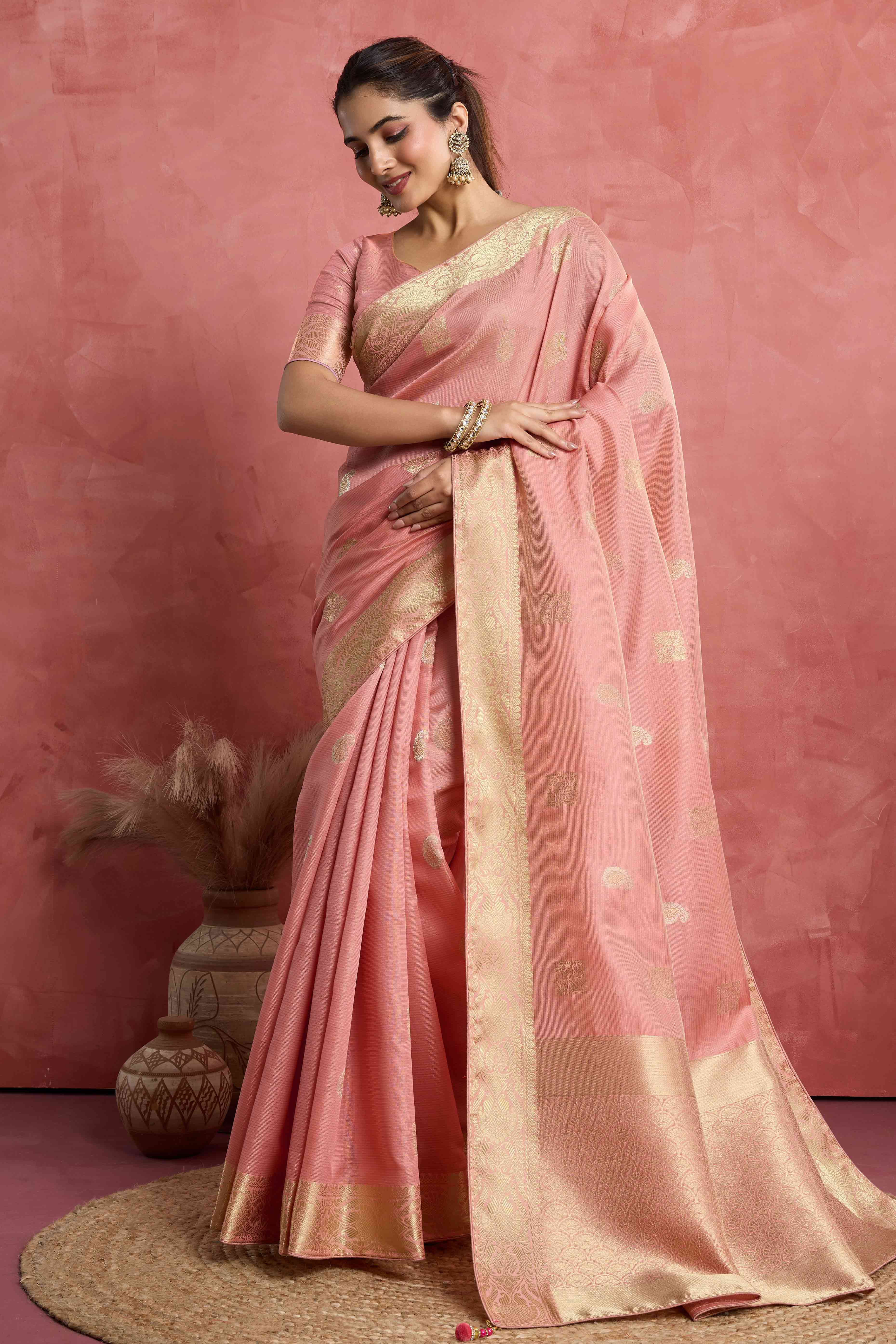 Contemporary Gajari Pink Silk Blend Saree Flaunting Alternate Buttas With Piping & Tassel Accents