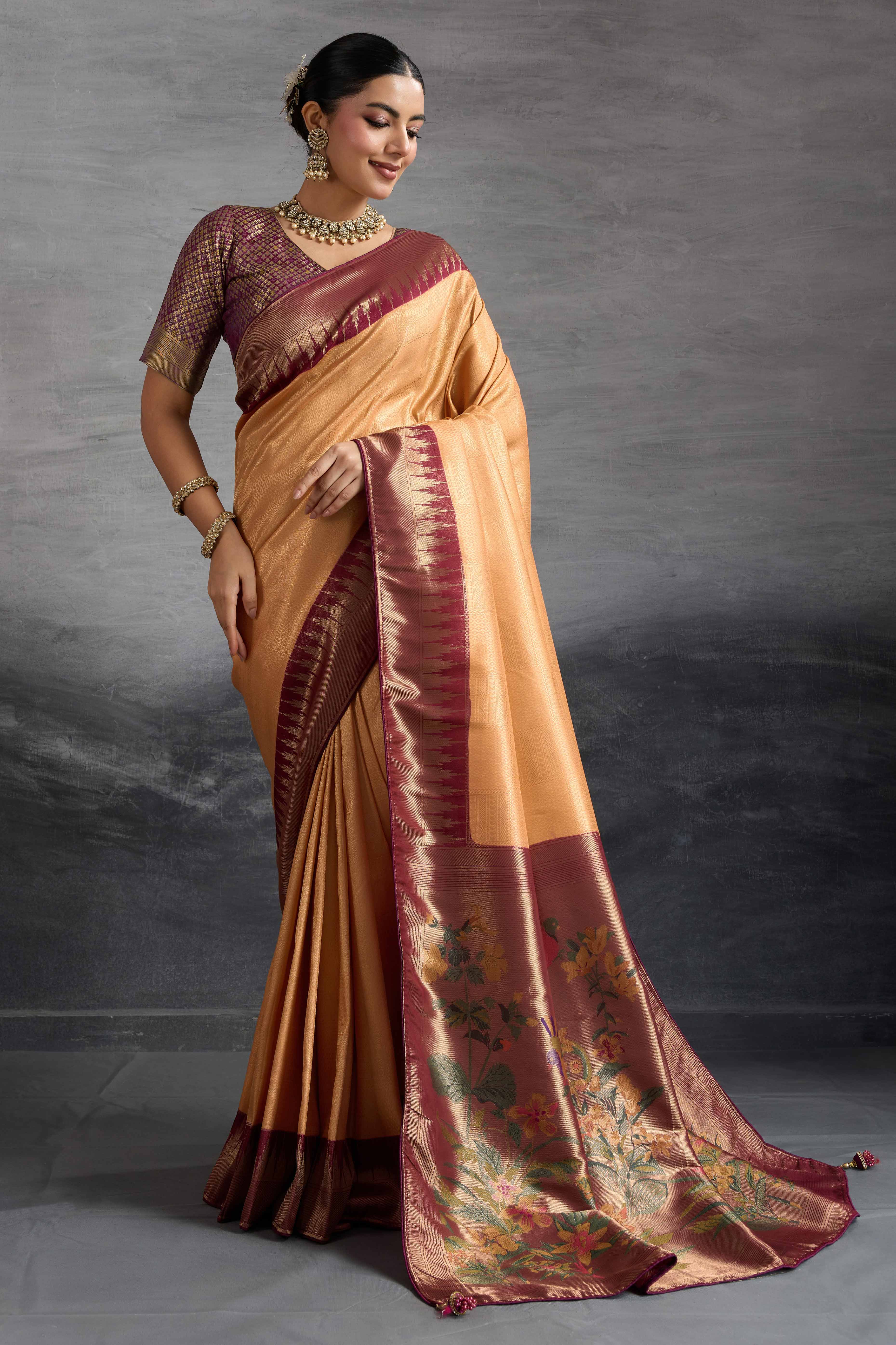 Light Orange Silk Kanjivaram Saree Enhanced With Kadiyal Weaving Borders