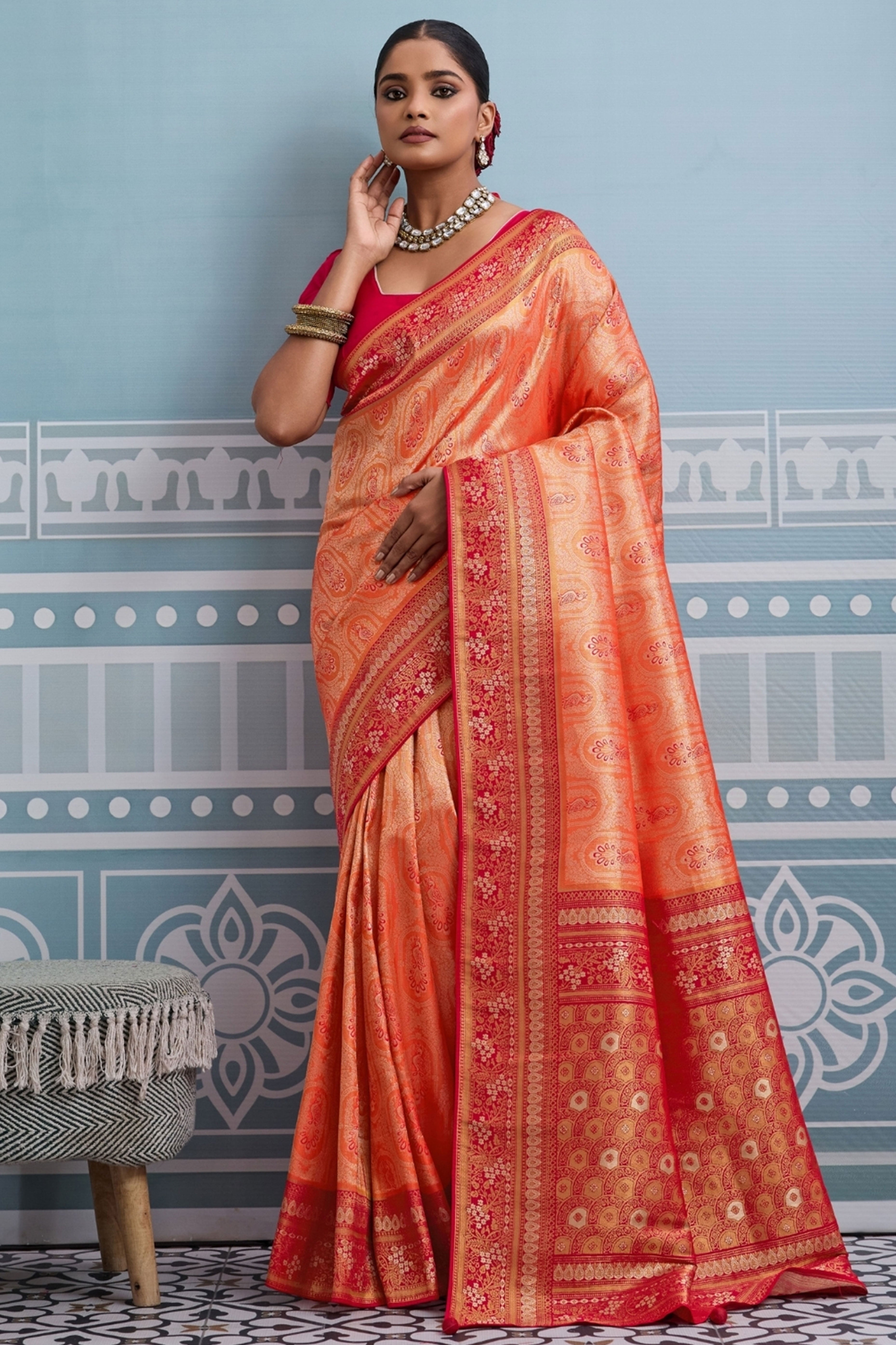 Orange Kanjivaram Silk Saree Accented with Traditional Zari Work