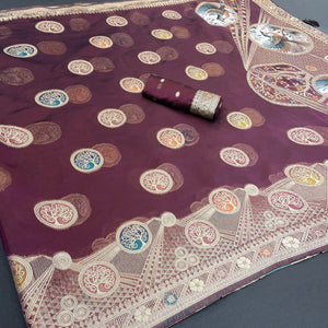 Charming Wine Zari Woven Floral Organza Saree Accented With Digital Printed Pallu & Latkan