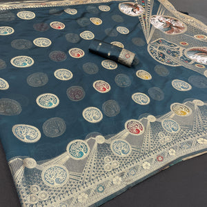 Charming Morpich Blue Zari Woven Floral Organza Saree Accented With Digital Printed Pallu & Latkan