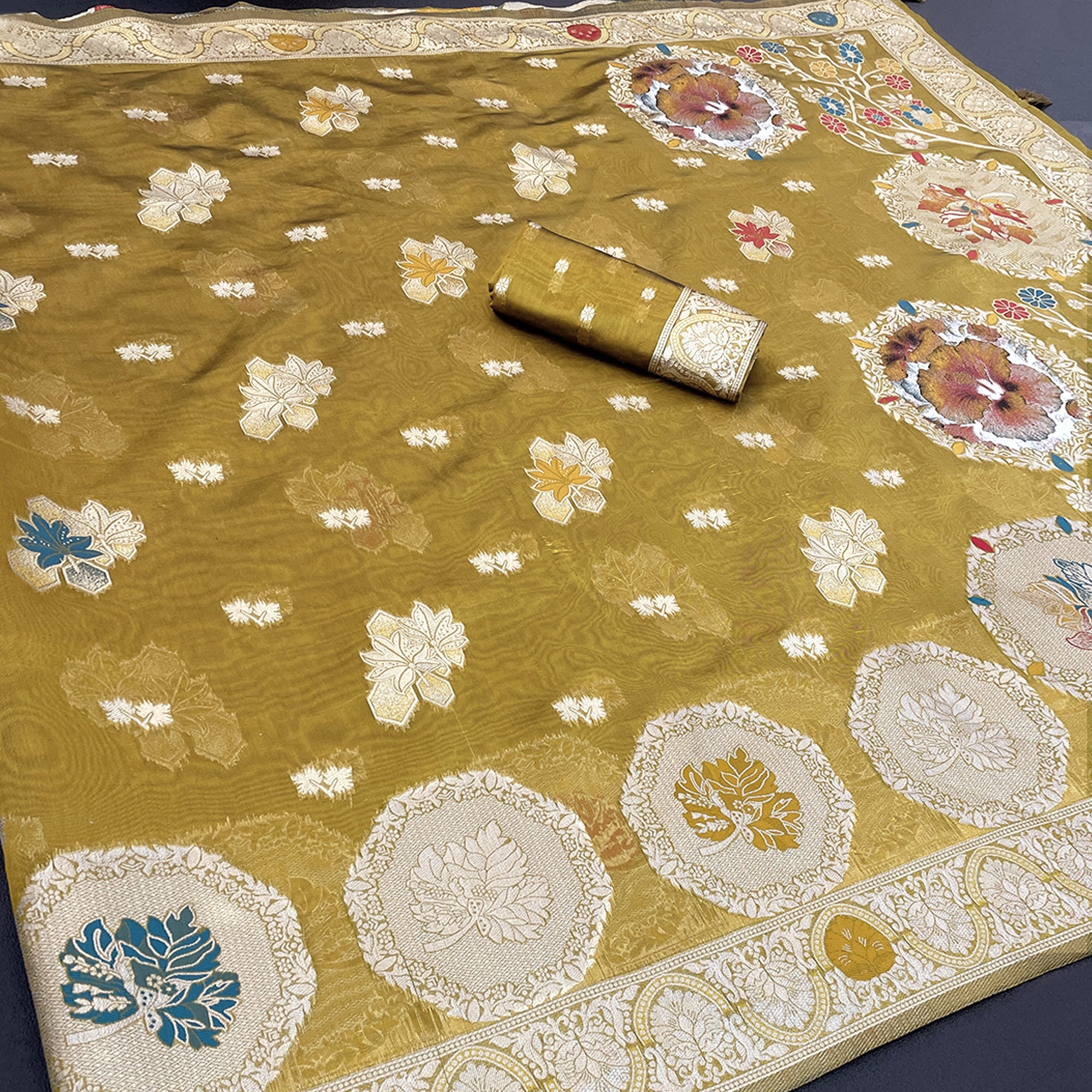 Charming Mehendi Green Zari Woven Floral Organza Saree Accented With Digital Printed Pallu & Latkan