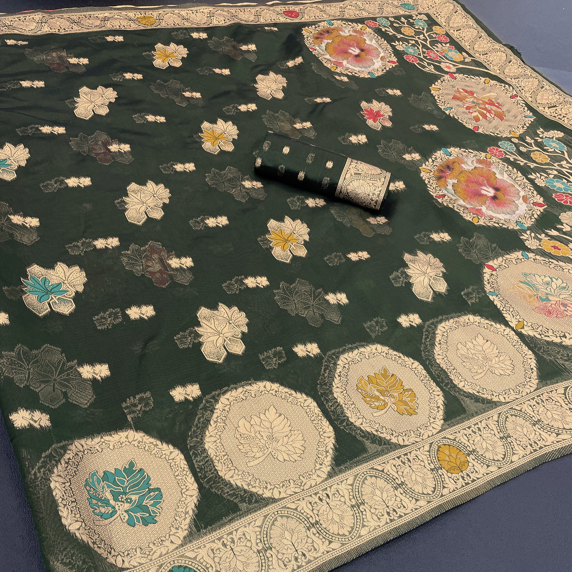 Charming Dark Green Zari Woven Floral Organza Saree Accented With Digital Printed Pallu & Latkan