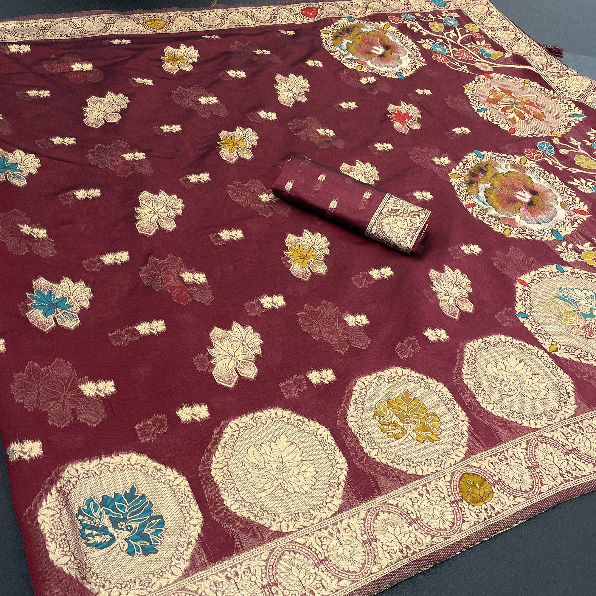 Charming Burgundy Zari Woven Floral Organza Saree Accented With Digital Printed Pallu & Latkan