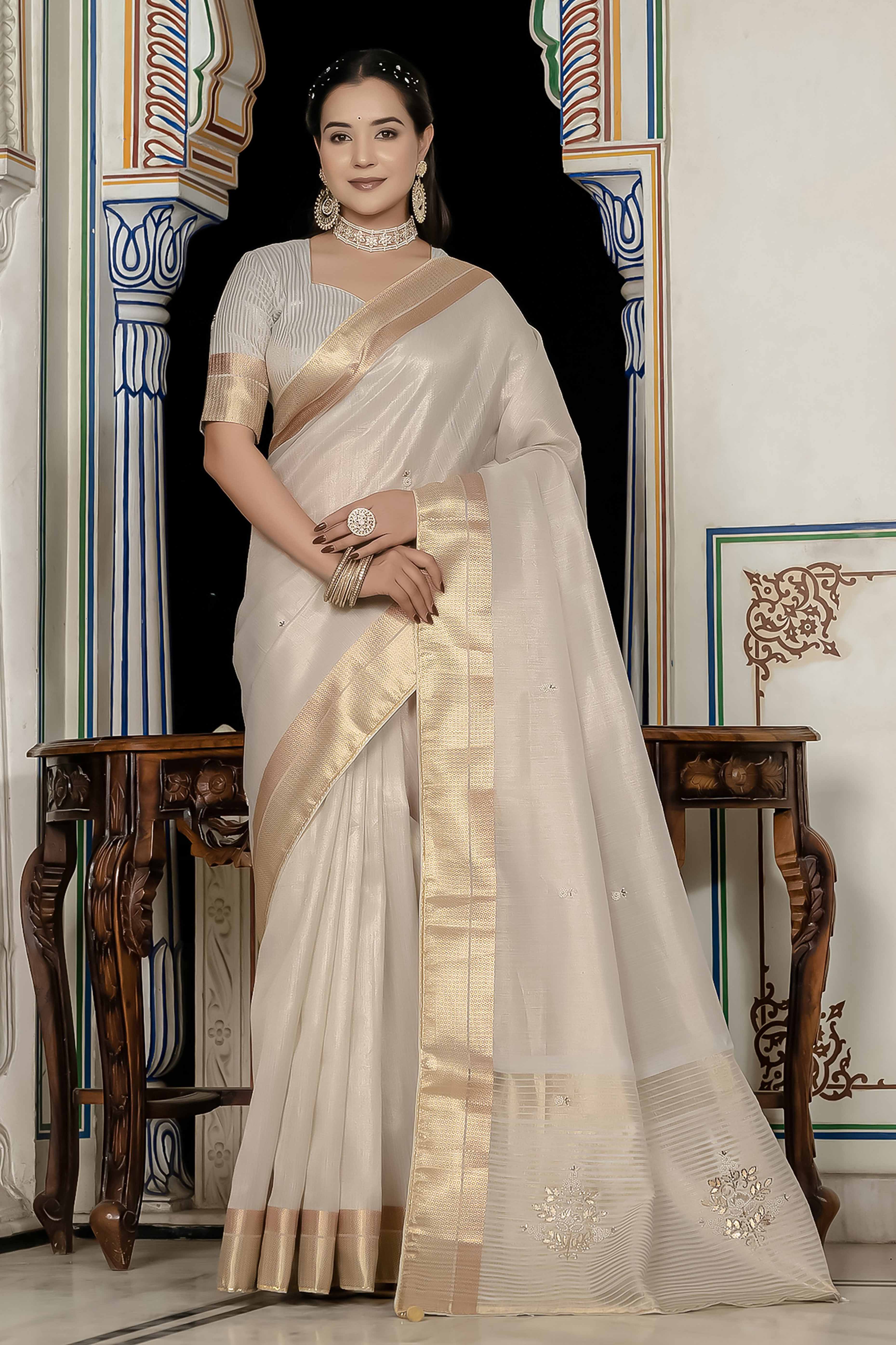 Off White Tissue Linen Saree Featuring Intricate Zari and Beadwork