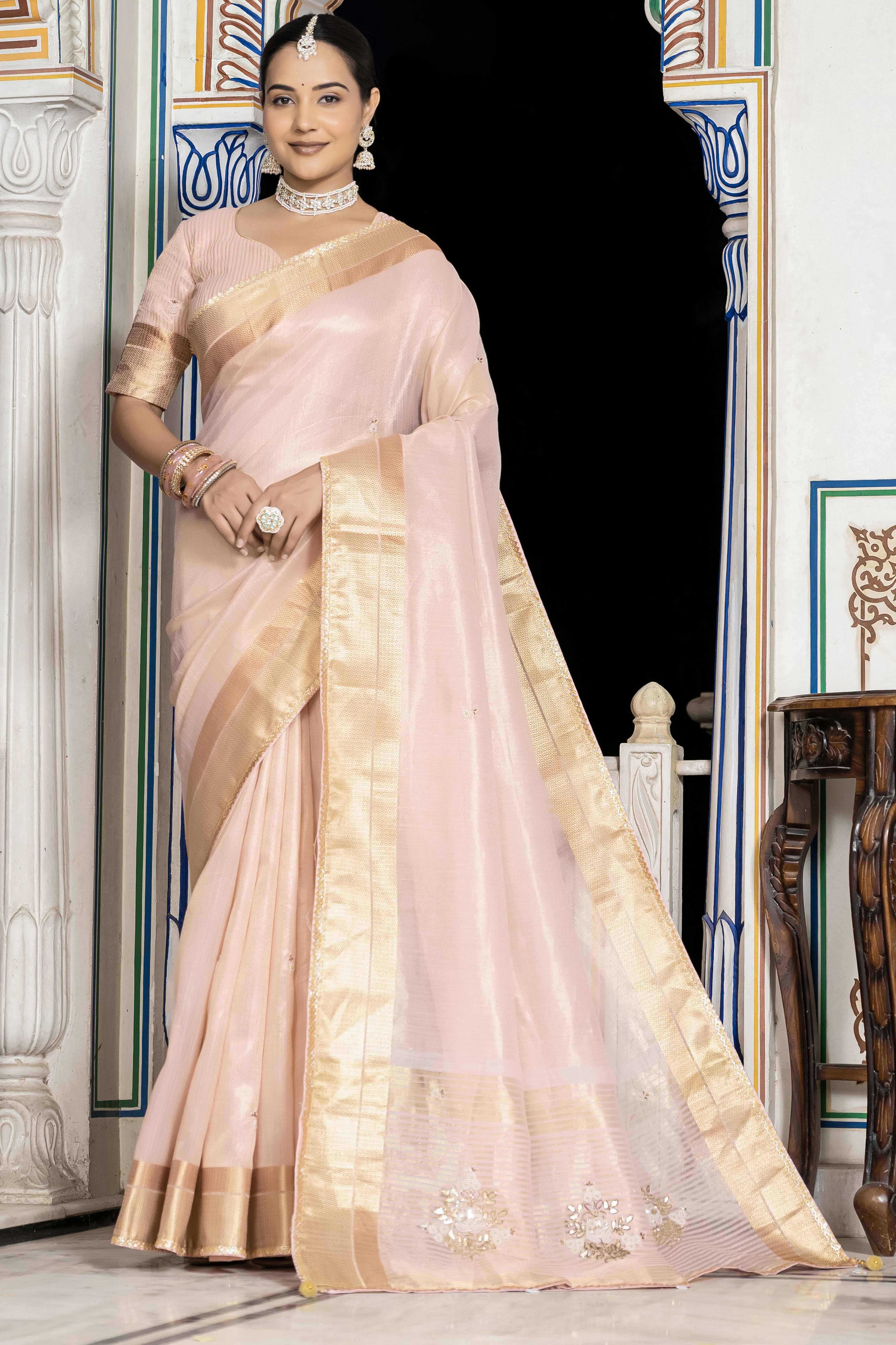 Pink Tissue Linen Saree Featuring Intricate Zari and Beadwork