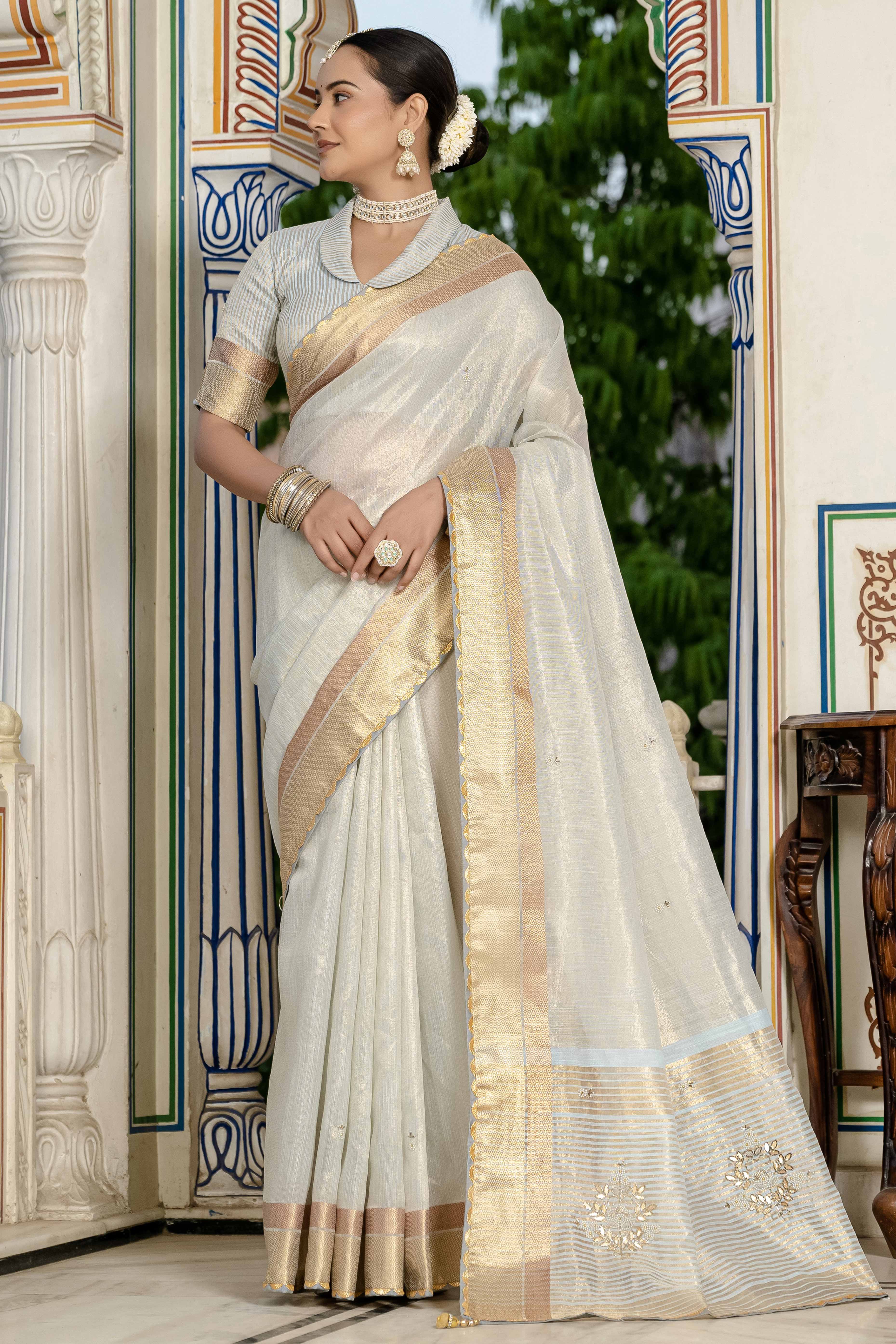 Sky Blue Tissue Linen Saree Featuring Intricate Zari and Beadwork
