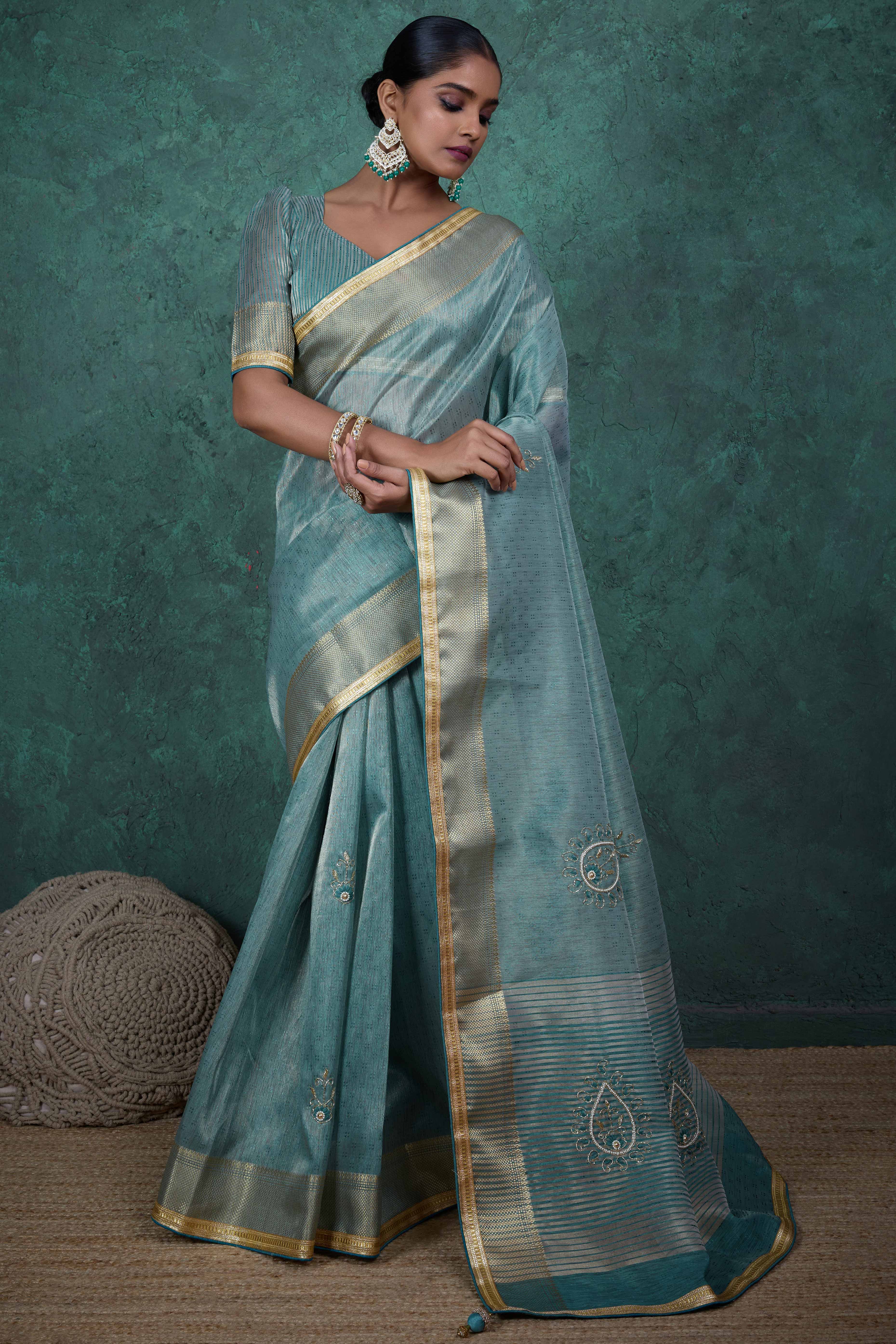 Teal Woven Linen Tissue Saree Featuring Beads Embellishment