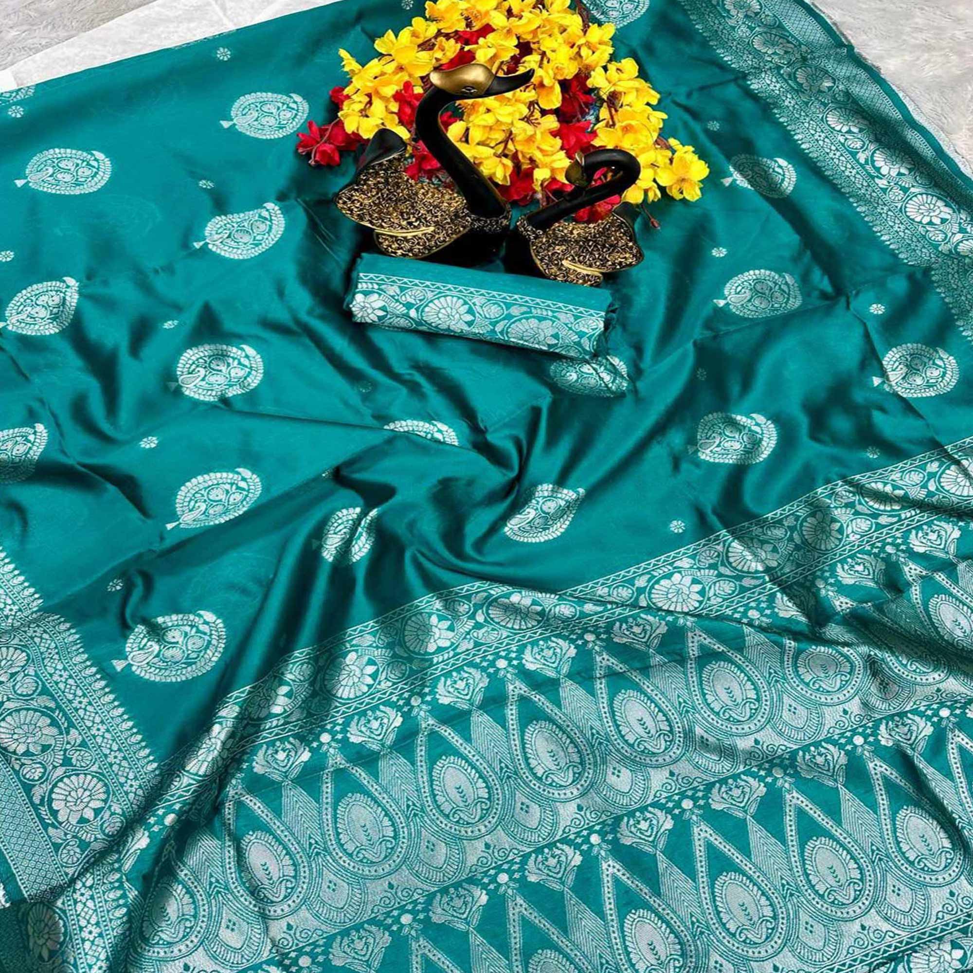 Elegant Teal Floral Zari Woven Lichi Banarasi Silk Saree With Rich Detailing