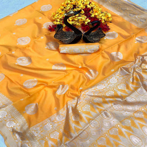 Vibrant Yellow Floral Zari Woven Lichi Banarasi Silk Saree With Rich Detailing