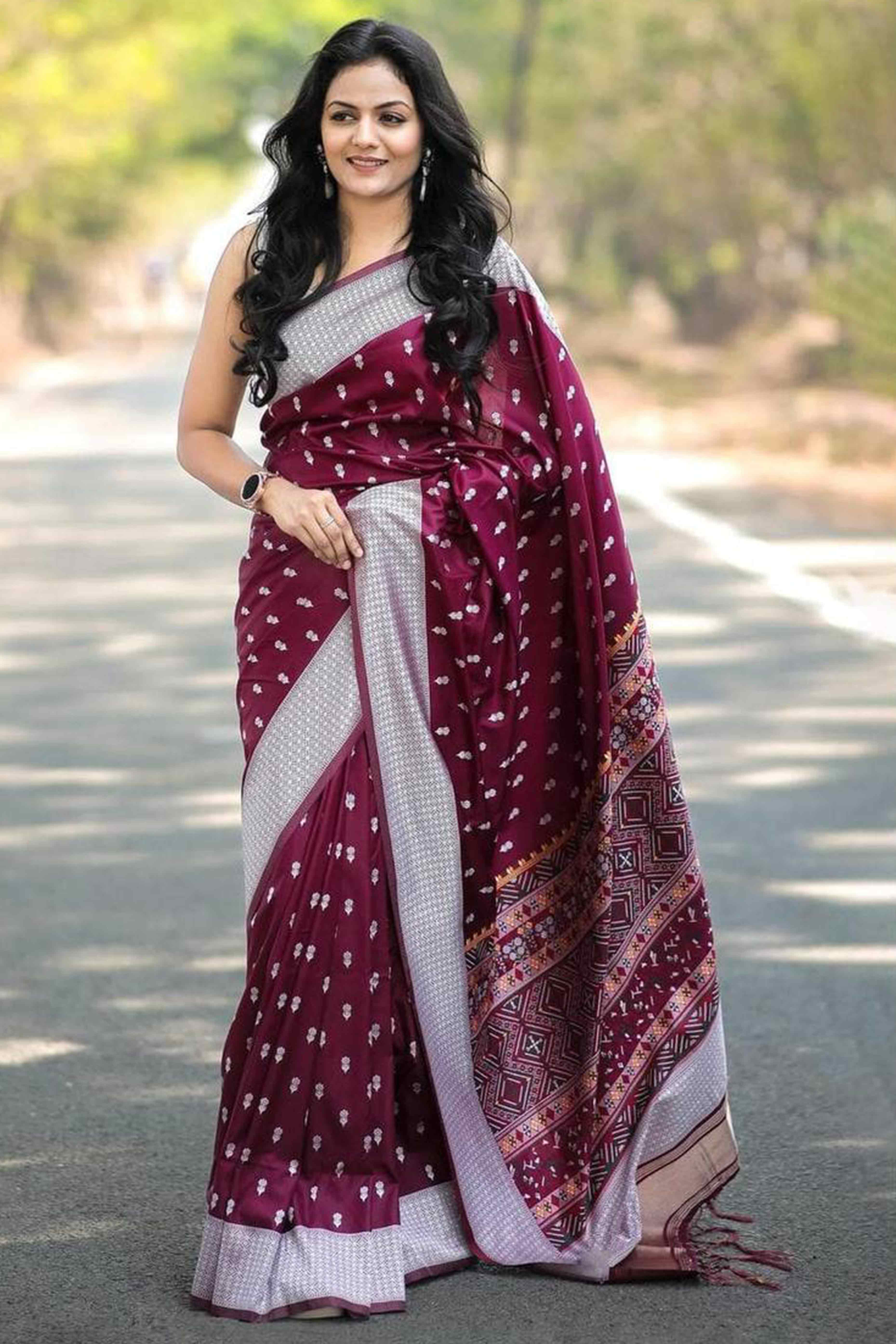 Wine Floral Woven Lichi Banarasi Silk Saree With Tassels