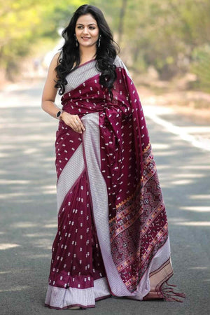 Wine Floral Woven Lichi Banarasi Silk Saree With Tassels