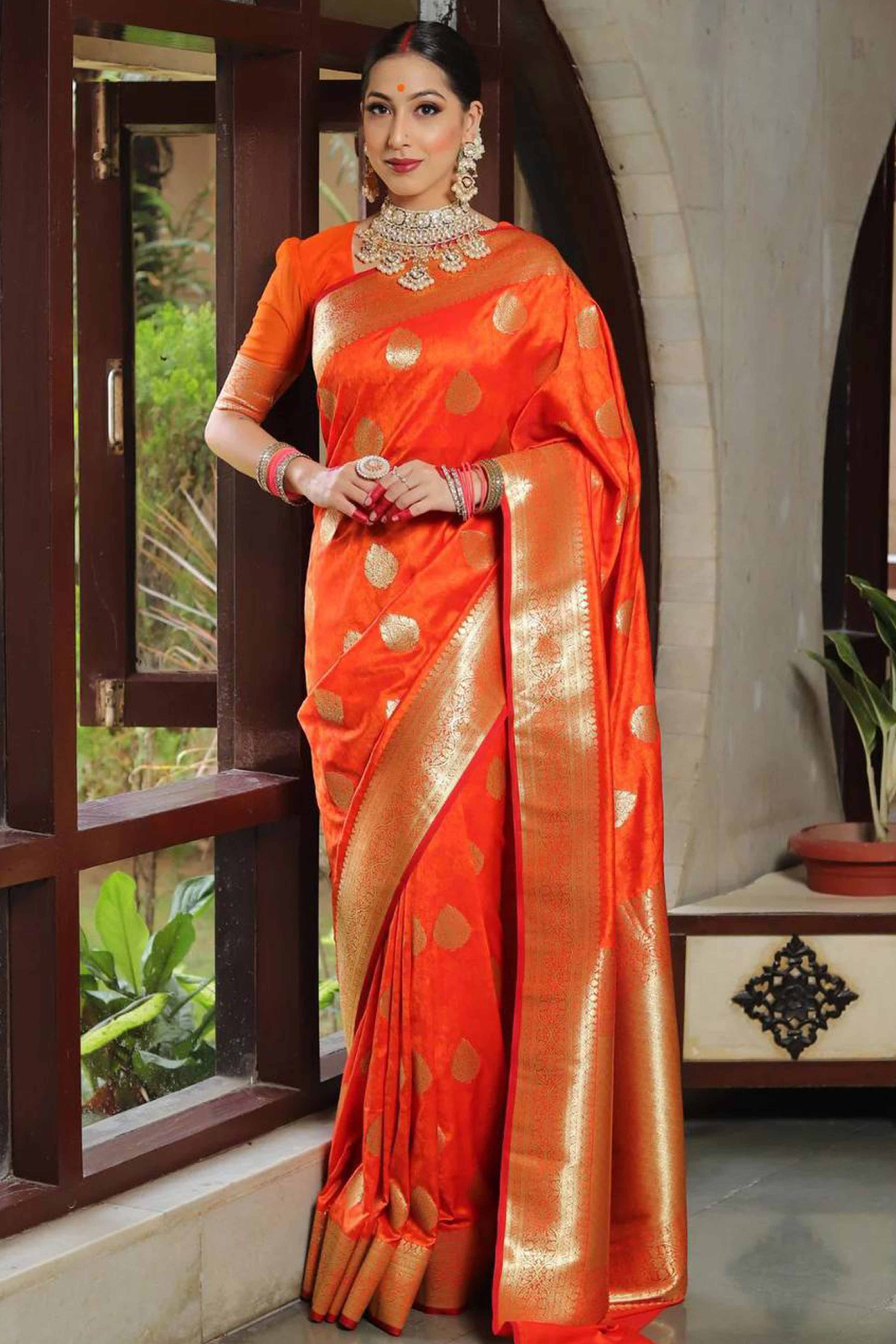 Orange Floral Woven Lichi Banarasi Silk Saree