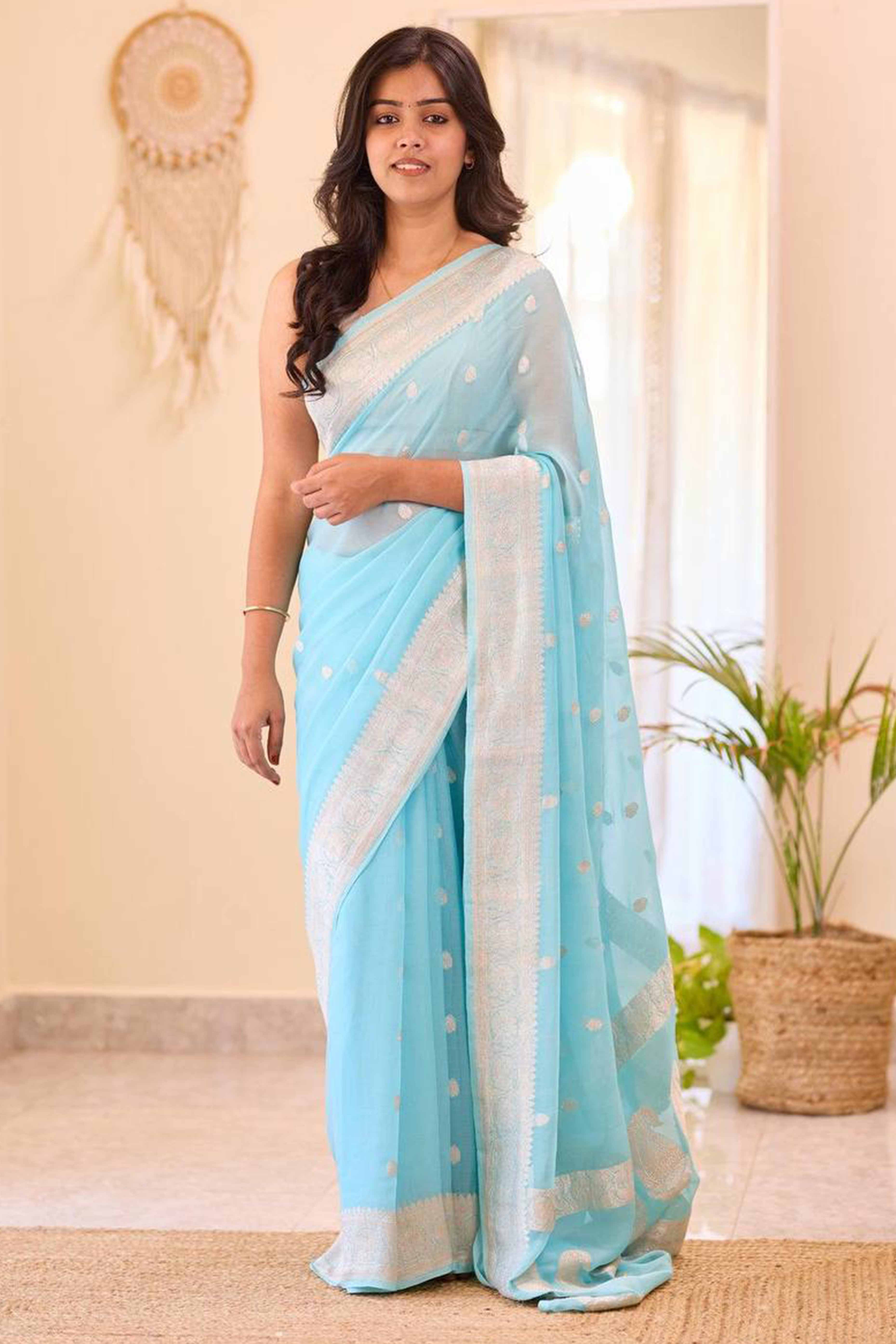 Sophisticated Sky Blue Linen Saree with Traditional Butti Zari Weaving
