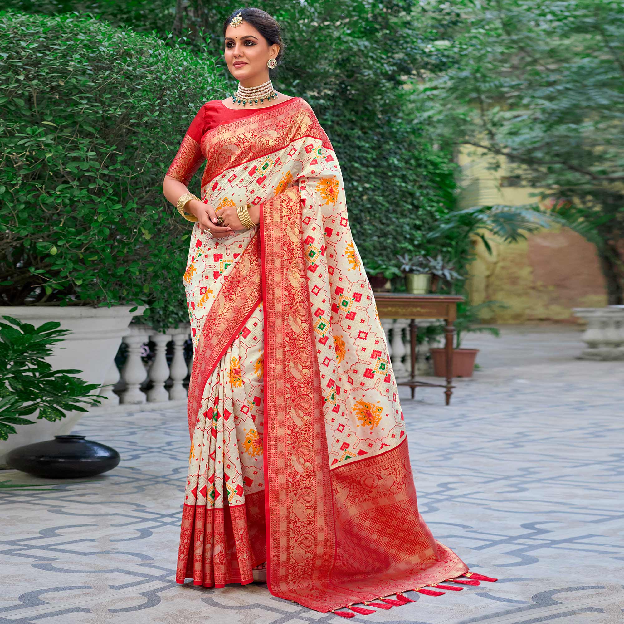 Cream Woven Art Silk Patola Saree With Tassels