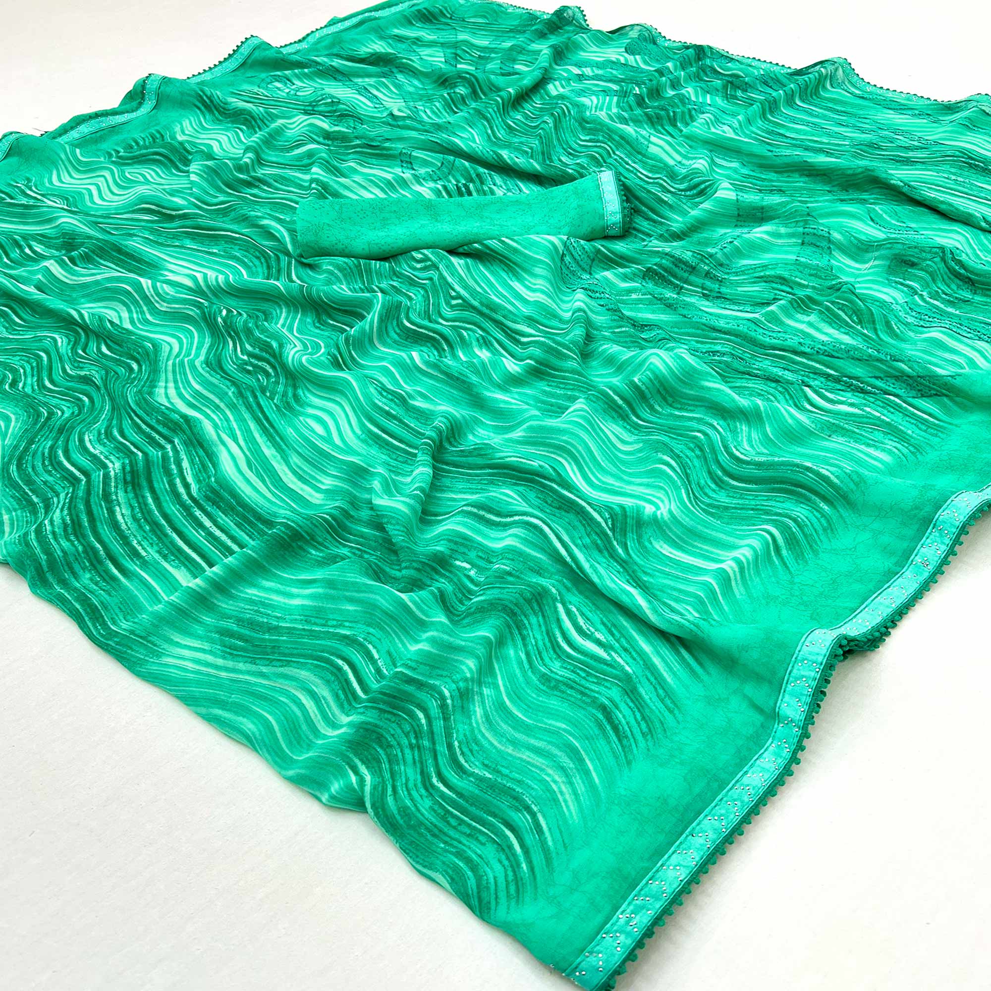 Rama Green Printed Georgette Saree With Fancy Lace Border