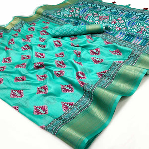 Rama Green Digital Printed Dola Silk Saree Adorned With Zari Weaving Border & Tassel Pallu