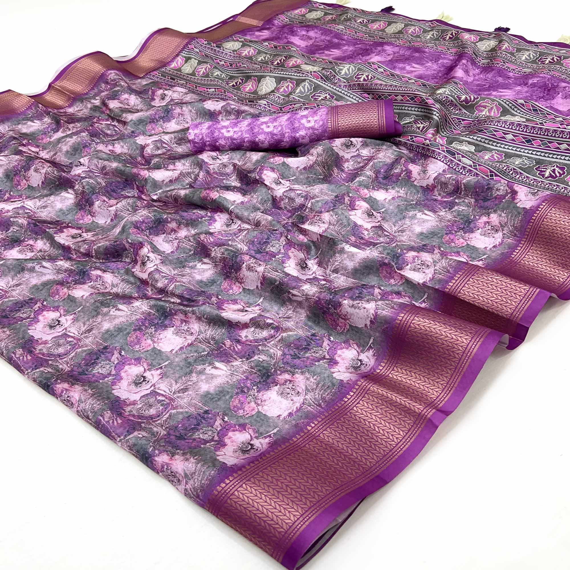 Purple Elegance In Dola Saree Featuring Blooming Digital Prints & Zari Border & Tassel Pallu