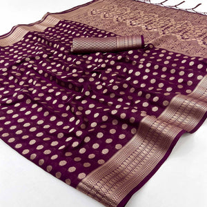 Wine Floral Zari Woven Crepe Silk Saree Accented With Tassel Pallu