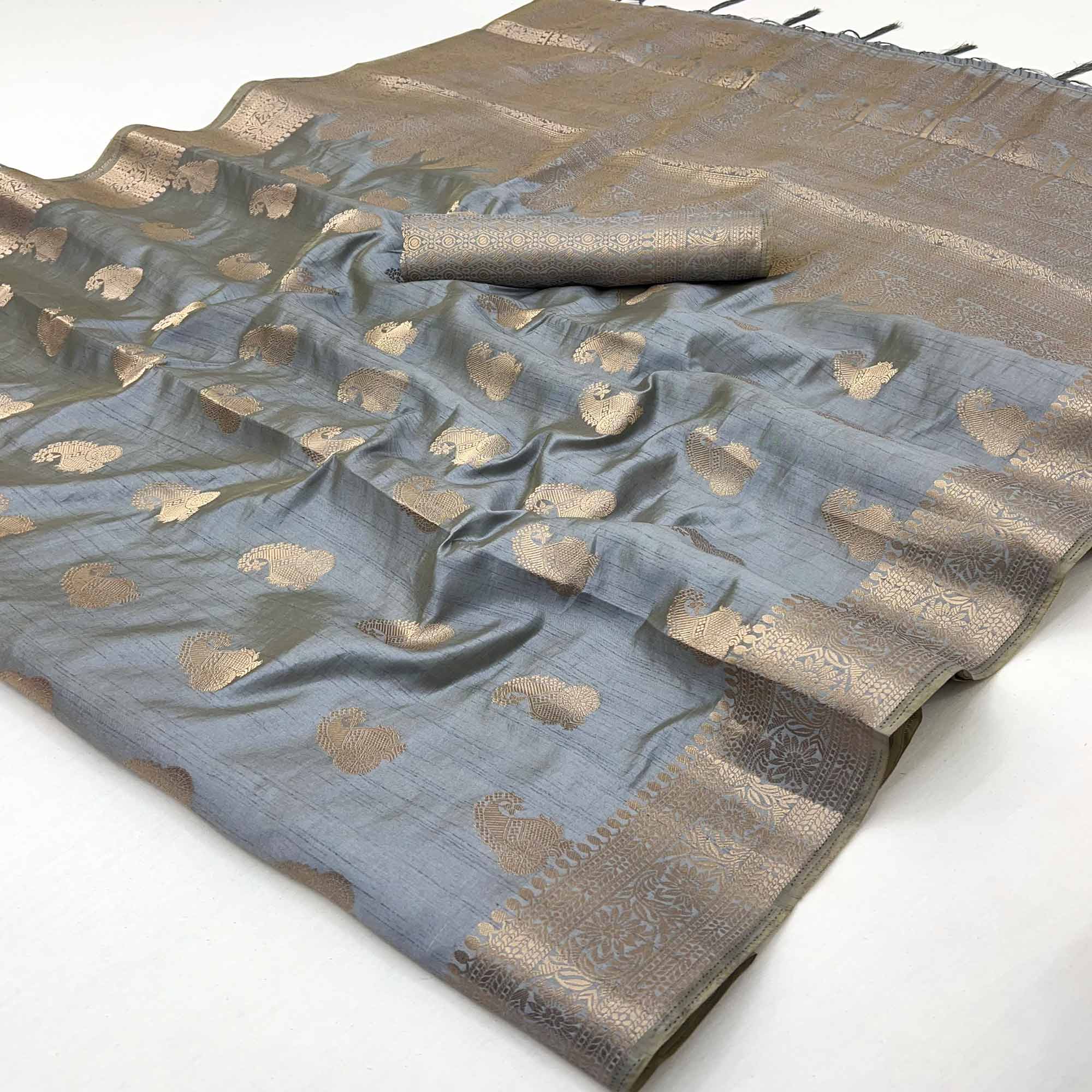 Grey Tusser Cotton Silk Saree Adorned With Floral Zari Weave & Tassel Pallu