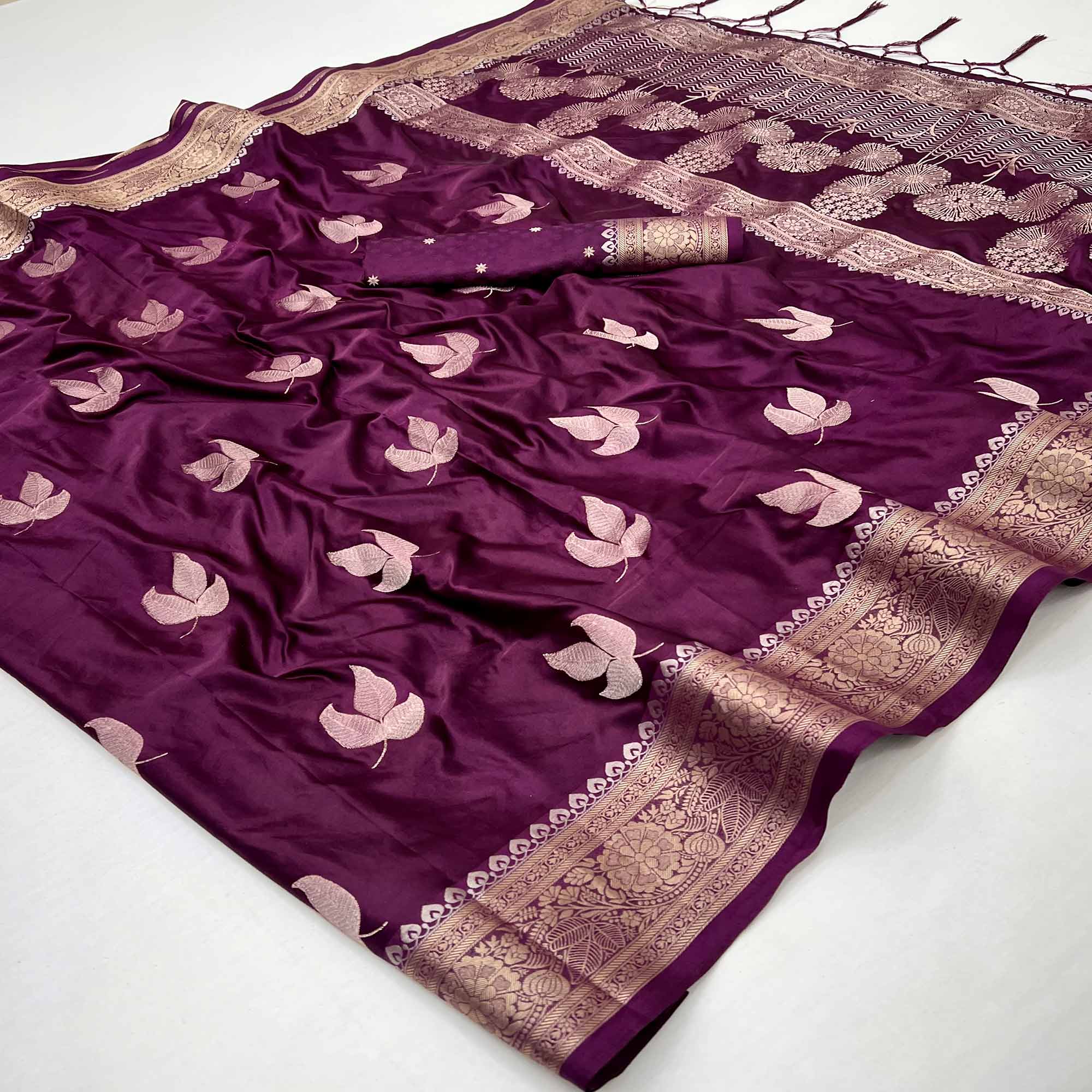 Wine Floral Zari Woven Satin Silk Saree With Graceful Tassel Pallu