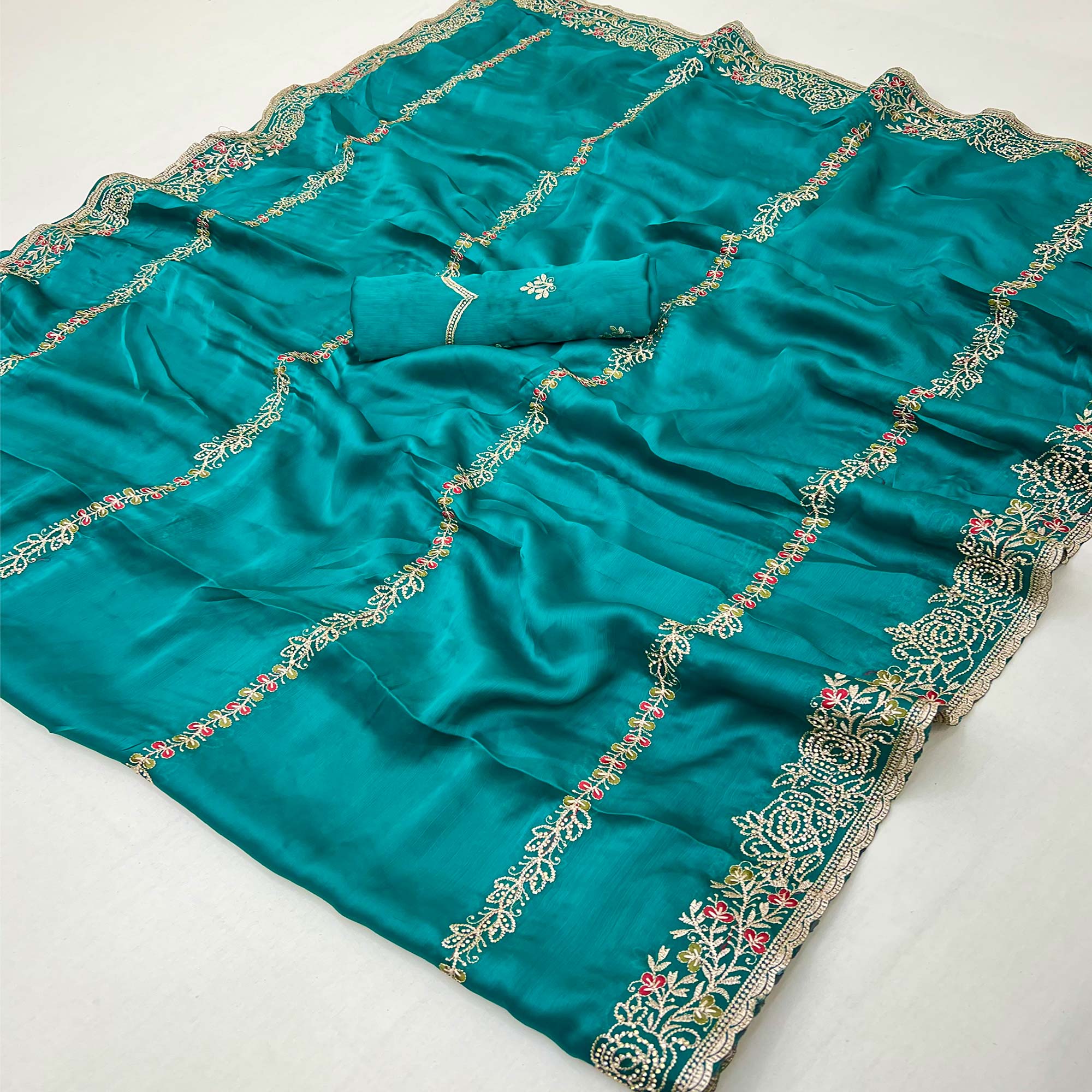 Teal Satin Chiffon Saree Adorned with Intricate Floral Embroidery
