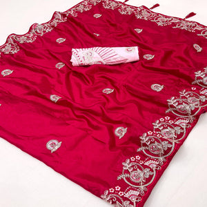 Rani Pink Embroidered Satin Saree with Smooth Texture and Graceful Festive Appeal