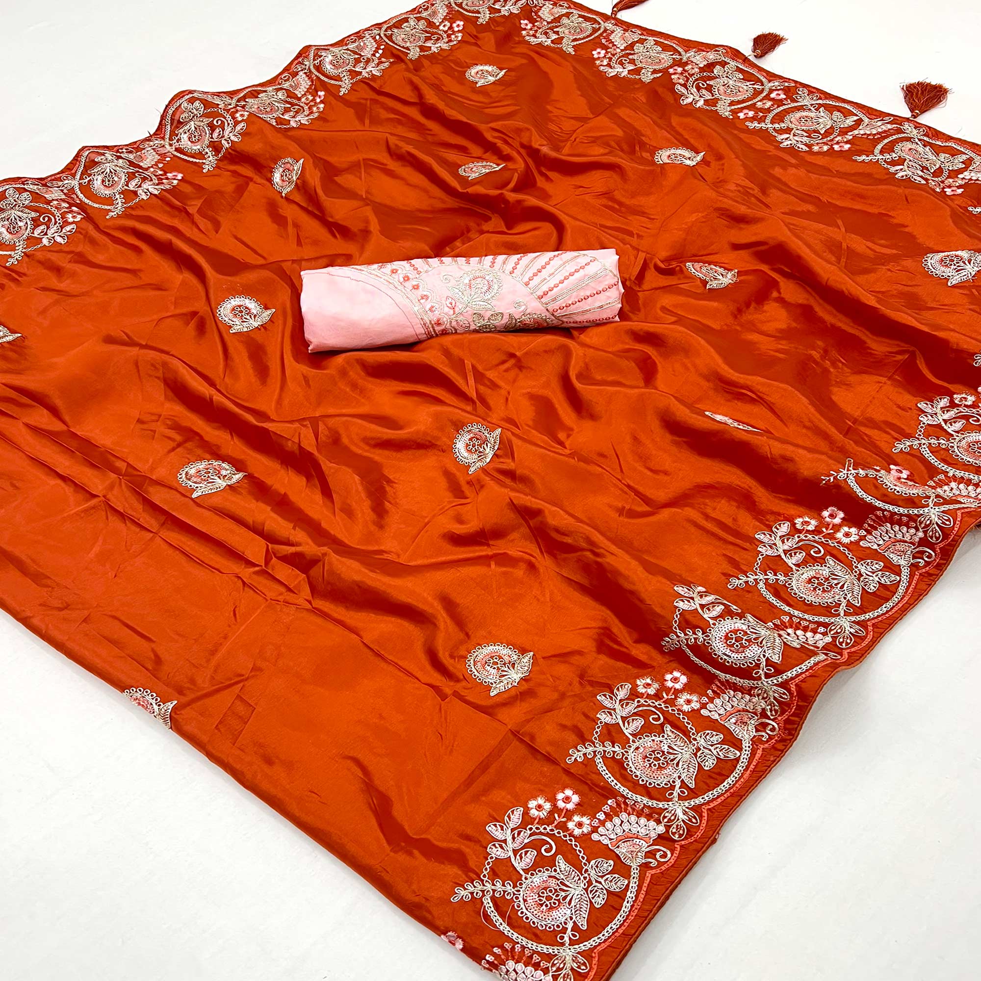 Orange Embroidered Satin Saree with Smooth Texture and Graceful Festive Appeal