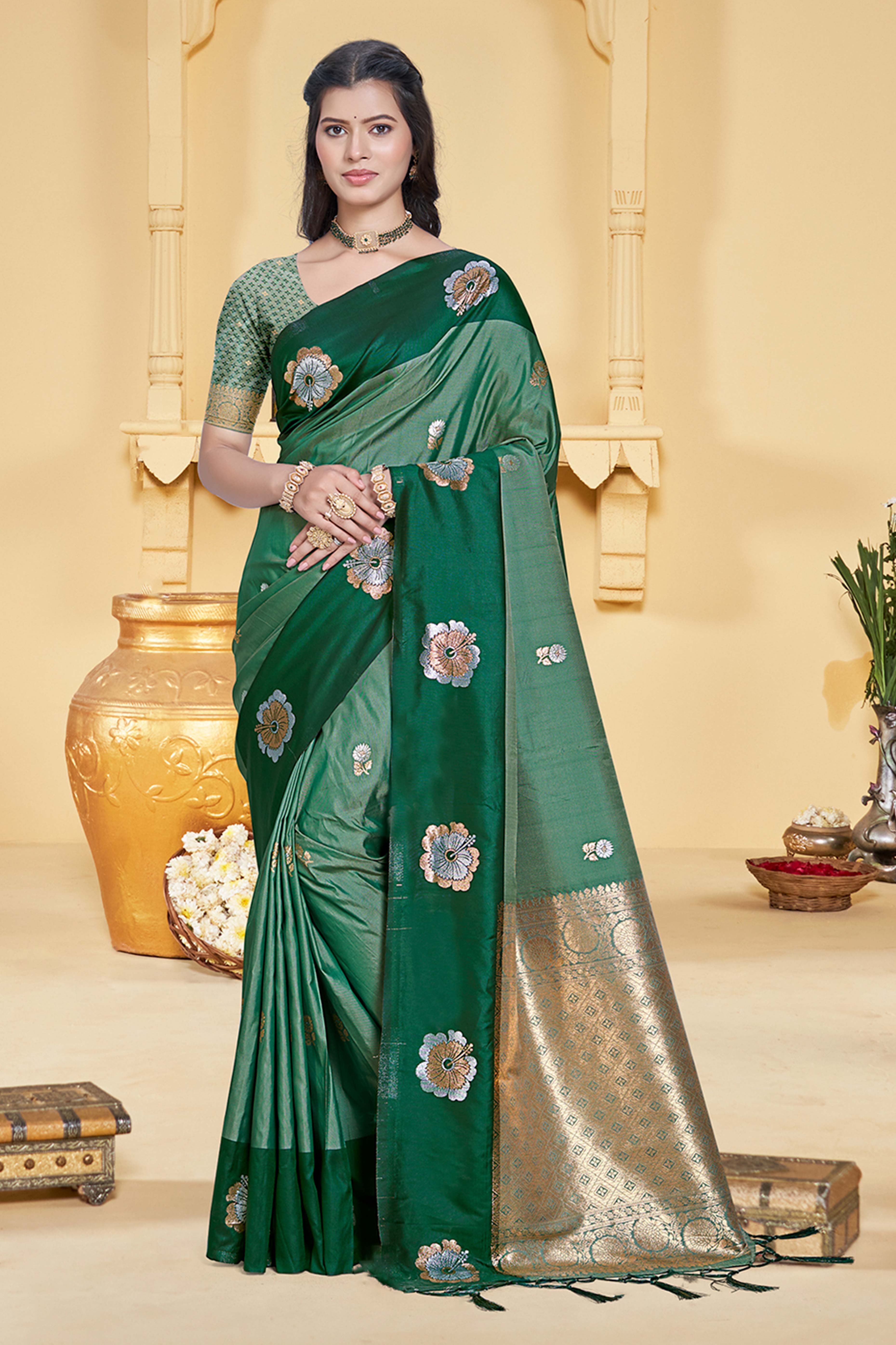 Charming Green Floral Zari Weaving Silk Blend Saree Enhanced With Stylish Tassel Pallu