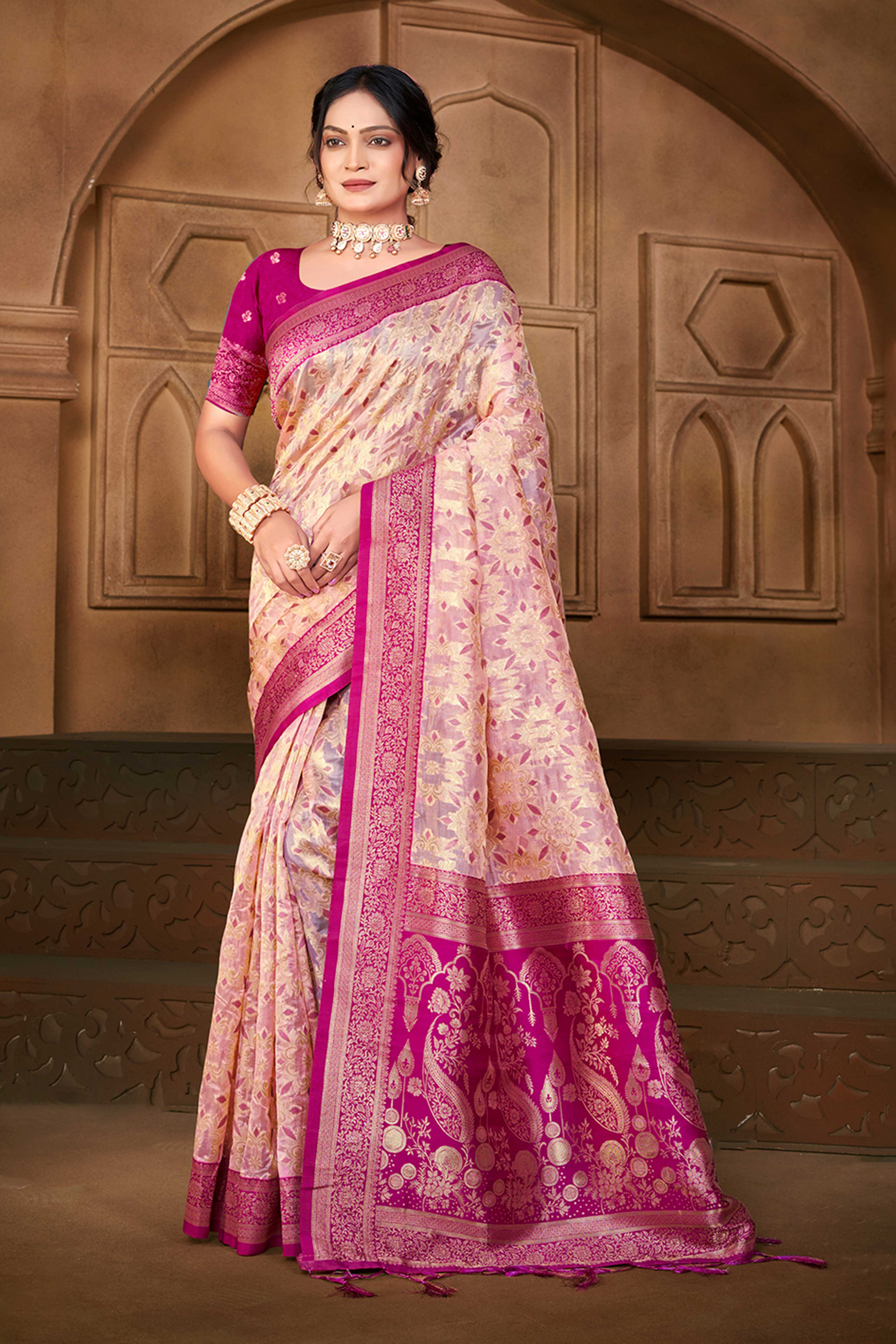 Stunning Pastel Magenta Floral Weaving Silk Blend Saree Enhanced With A Stylish Tassel Pallu