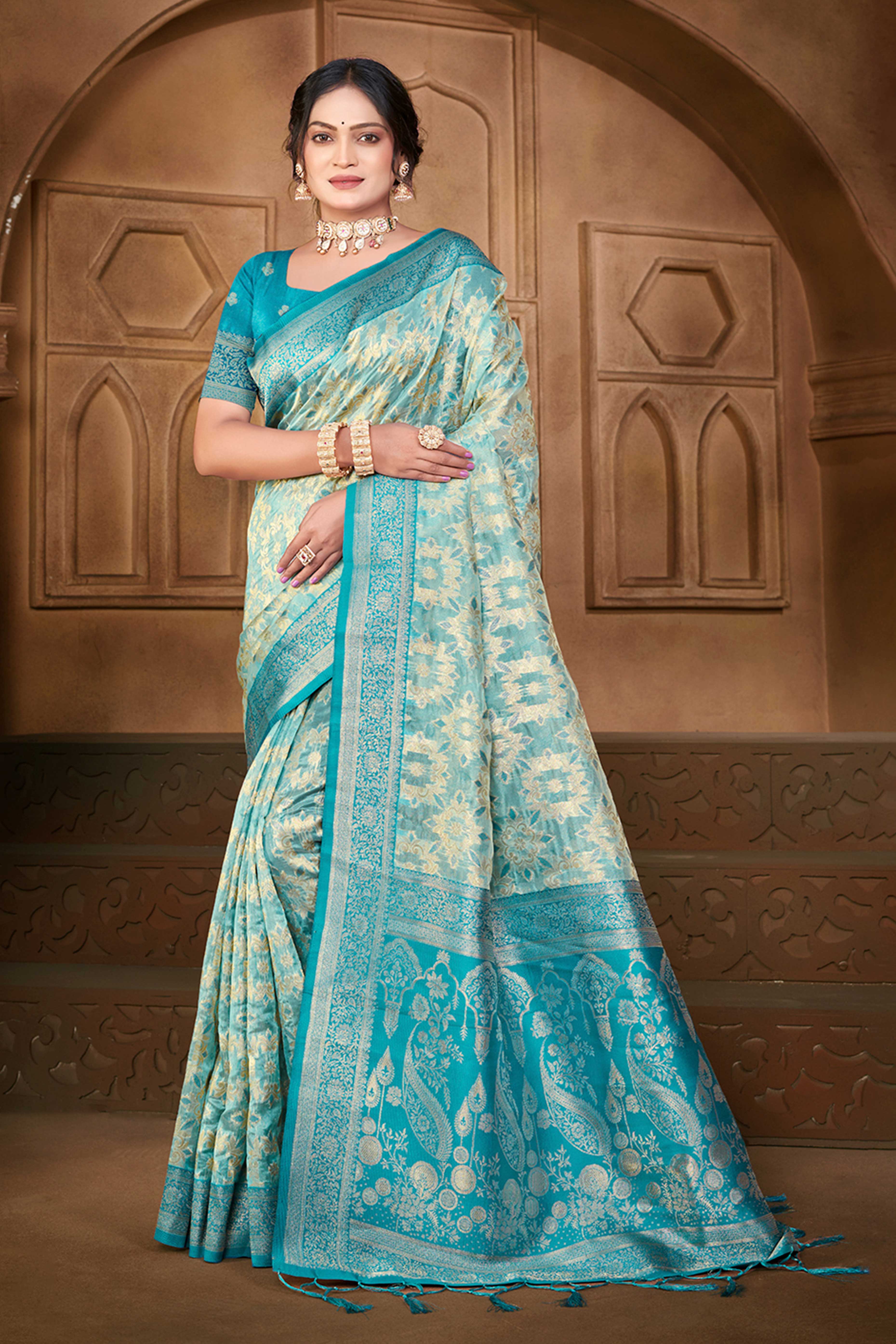 Stunning Blue Floral Weaving Silk Blend Saree Enhanced With A Stylish Tassel Pallu