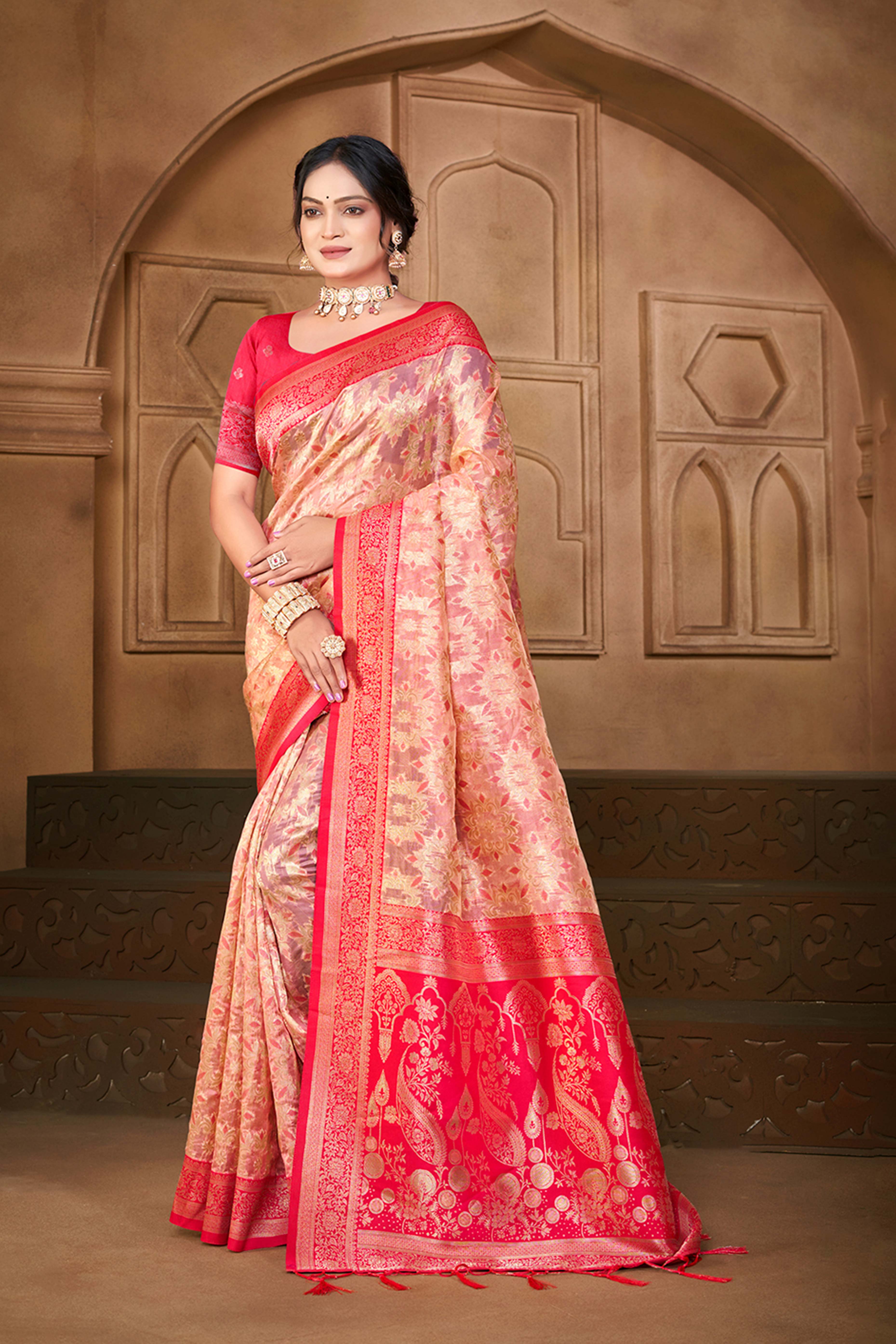 Stunning Pink Floral Weaving Silk Blend Saree Enhanced With A Stylish Tassel Pallu