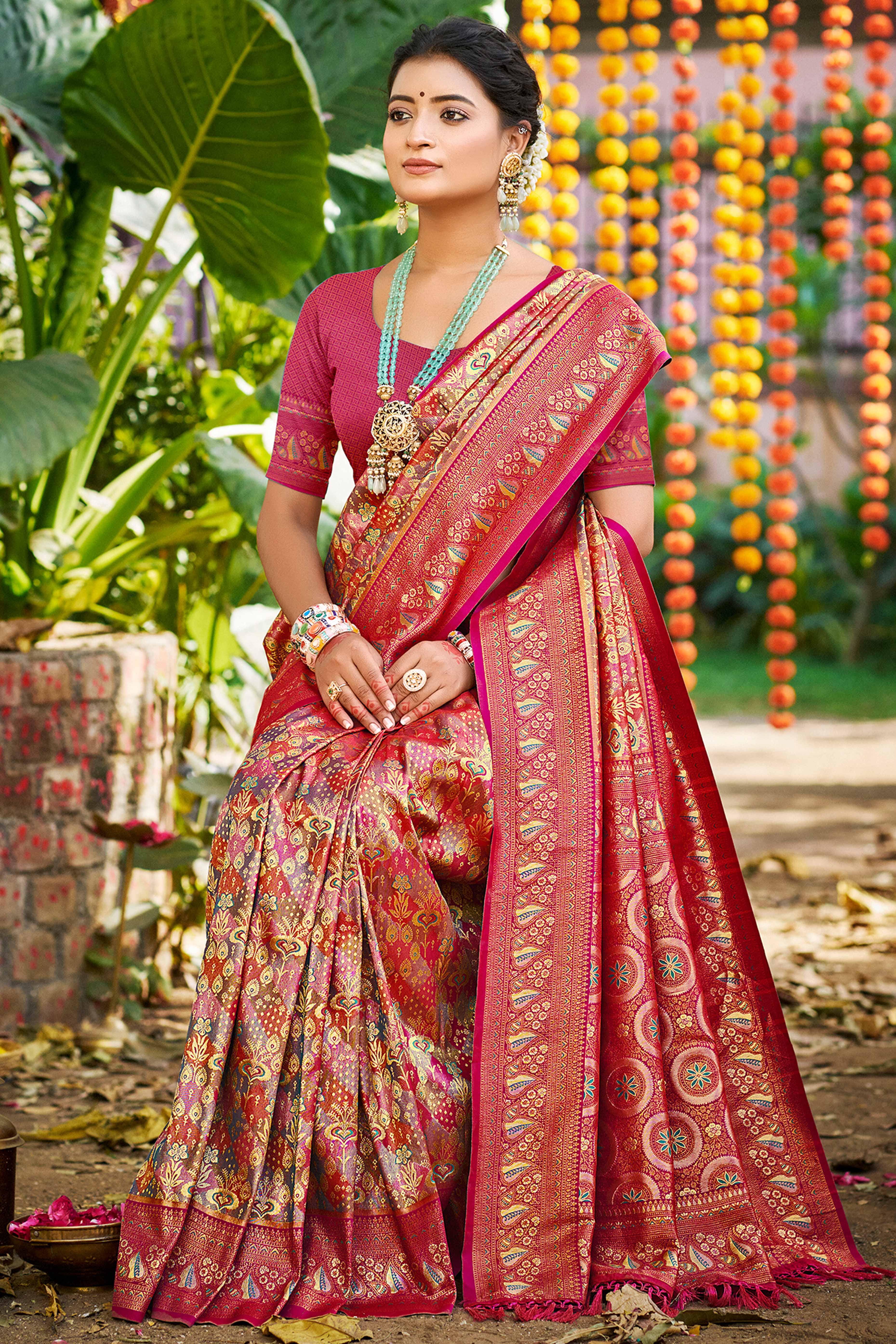 Magenta Floral Weaving Silk Blend Dharmavaram Saree Accented With Tassel Pallu