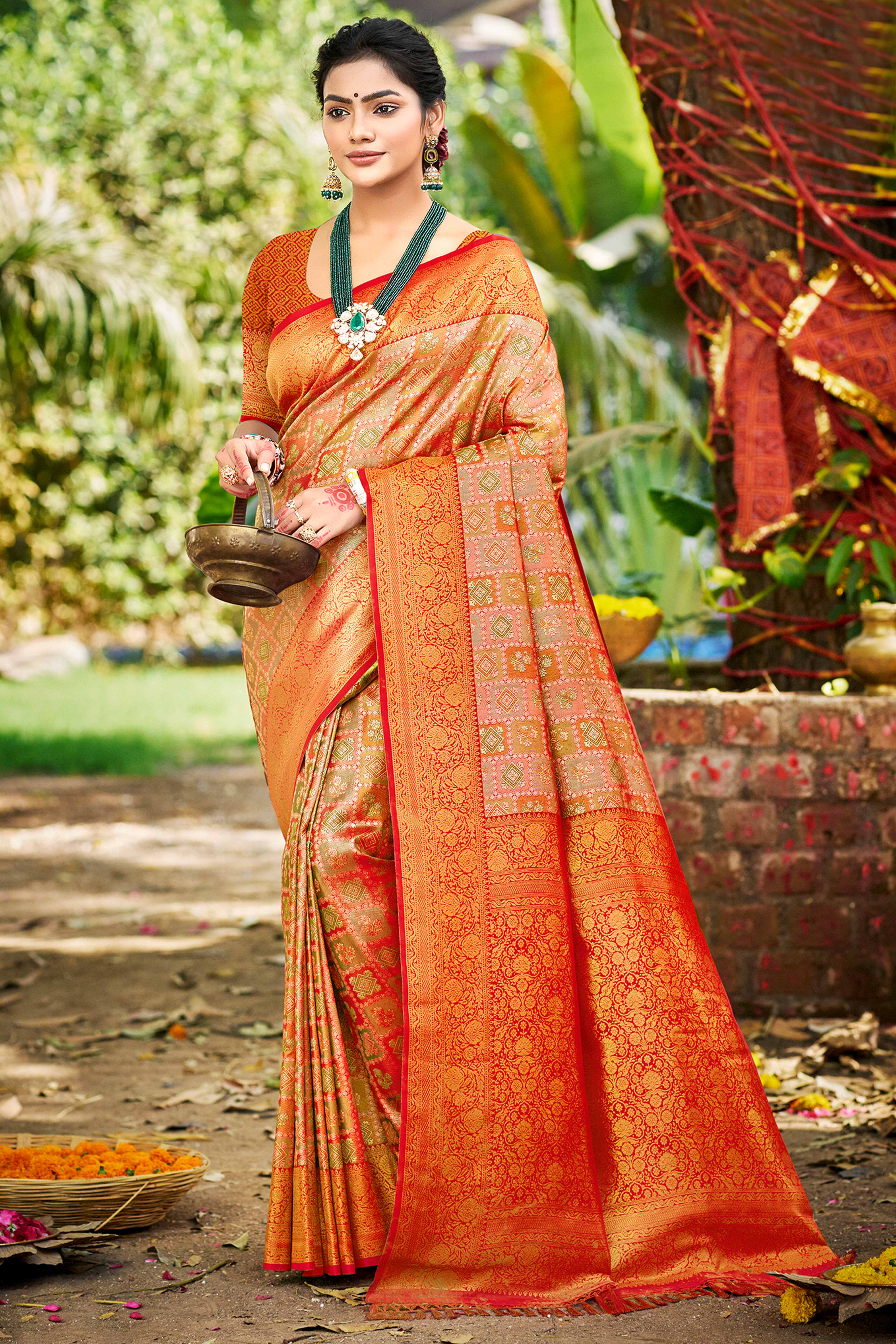Orange Silk Blend Dharmavaram Saree Featuring Ornate Floral Weaves & Tassels Pallu