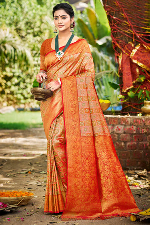 Orange Silk Blend Dharmavaram Saree Featuring Ornate Floral Weaves & Tassels Pallu