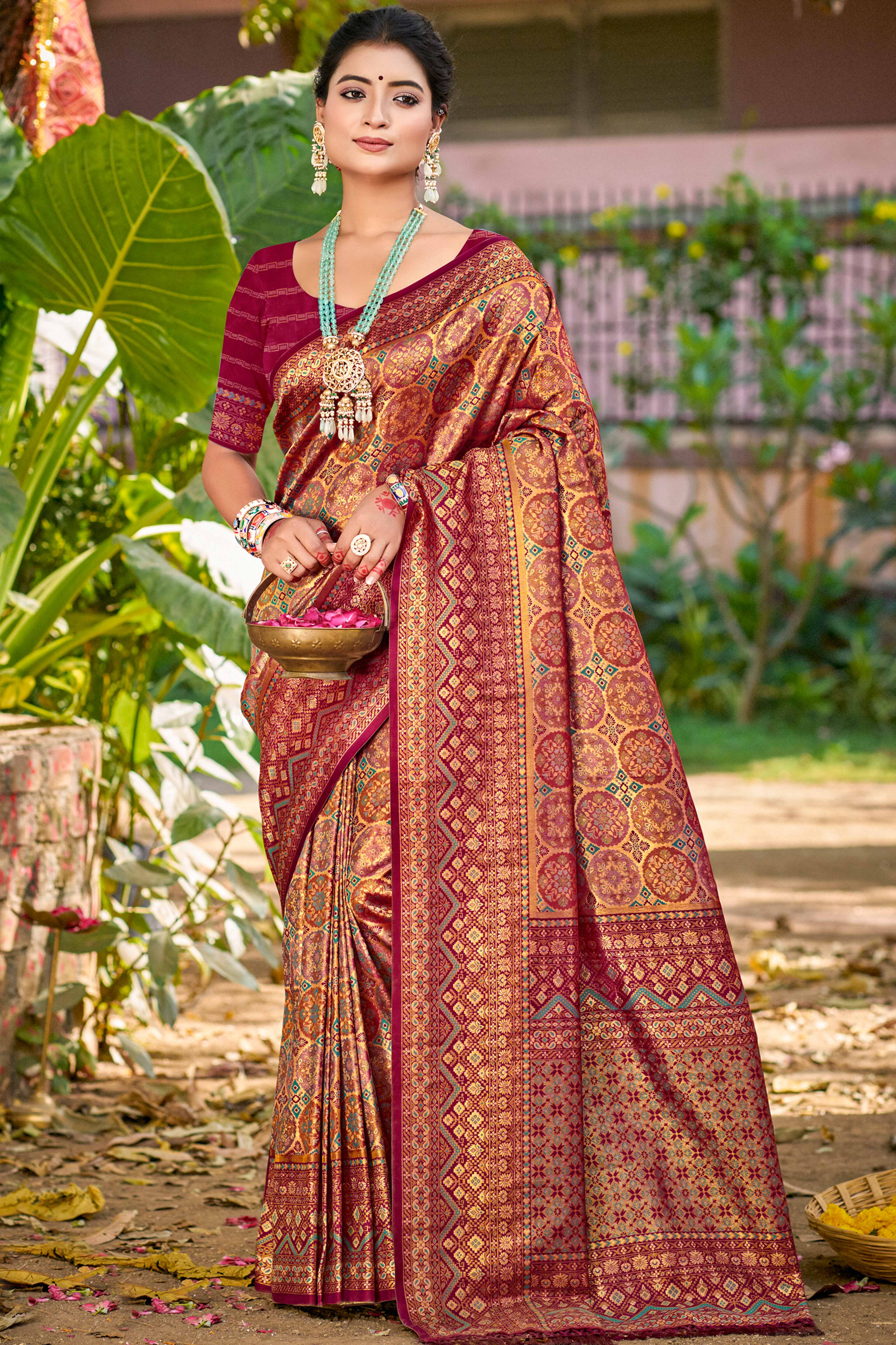 Floral Patterned Wine Woven Silk Blend Dharmavaram Saree With Tassel Elegance