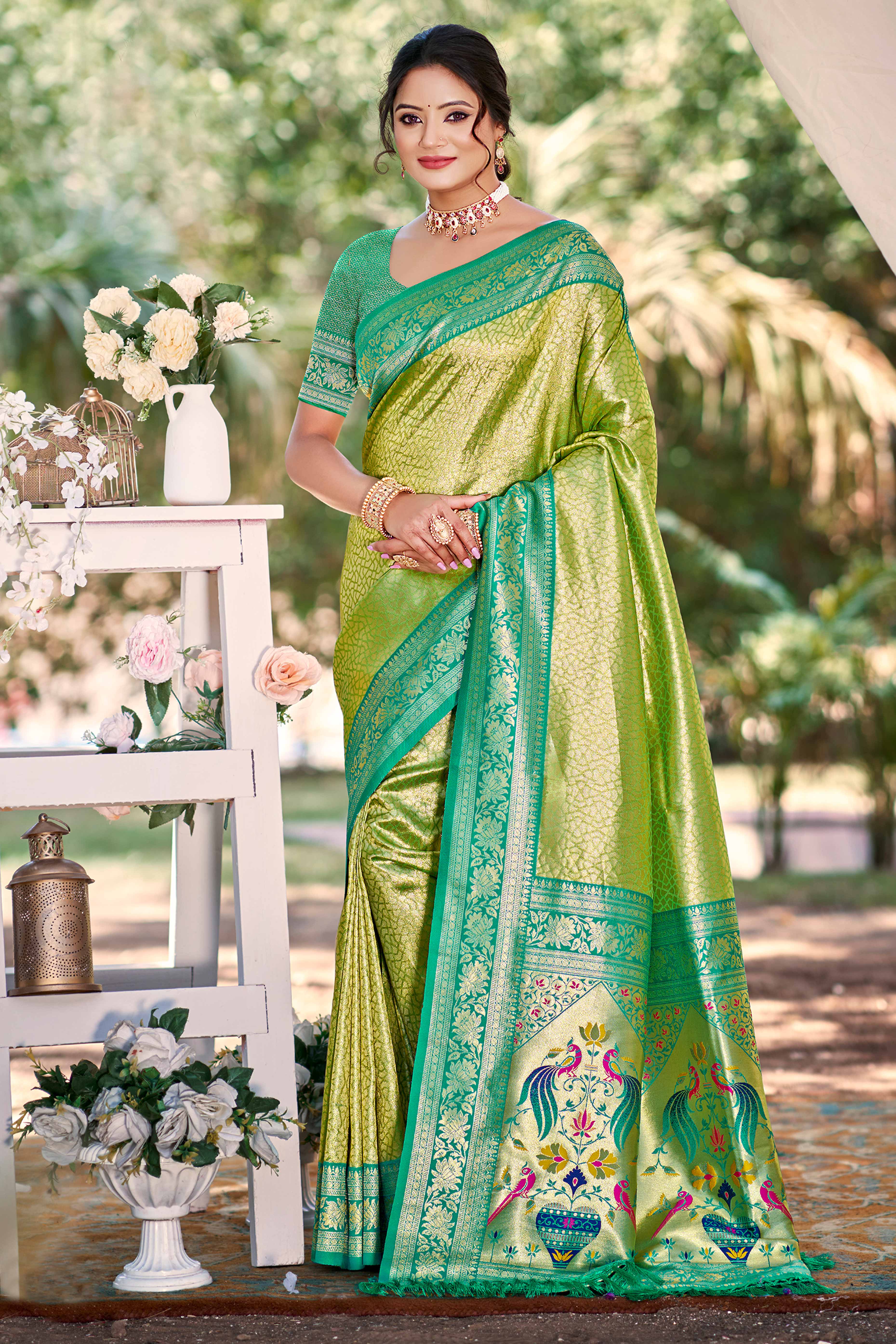 Green Kanjivaram Silk Paithani Saree With Elegant Floral Weaving & Tassel Pallu