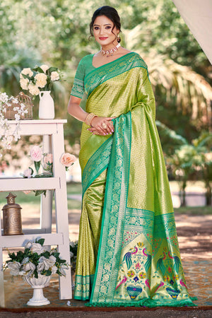 Green Kanjivaram Silk Paithani Saree With Elegant Floral Weaving & Tassel Pallu