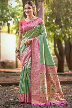 Rama Green Paithani Saree In Kanjivaram Silk Featuring Floral Woven Motifs & Tassel Pallu