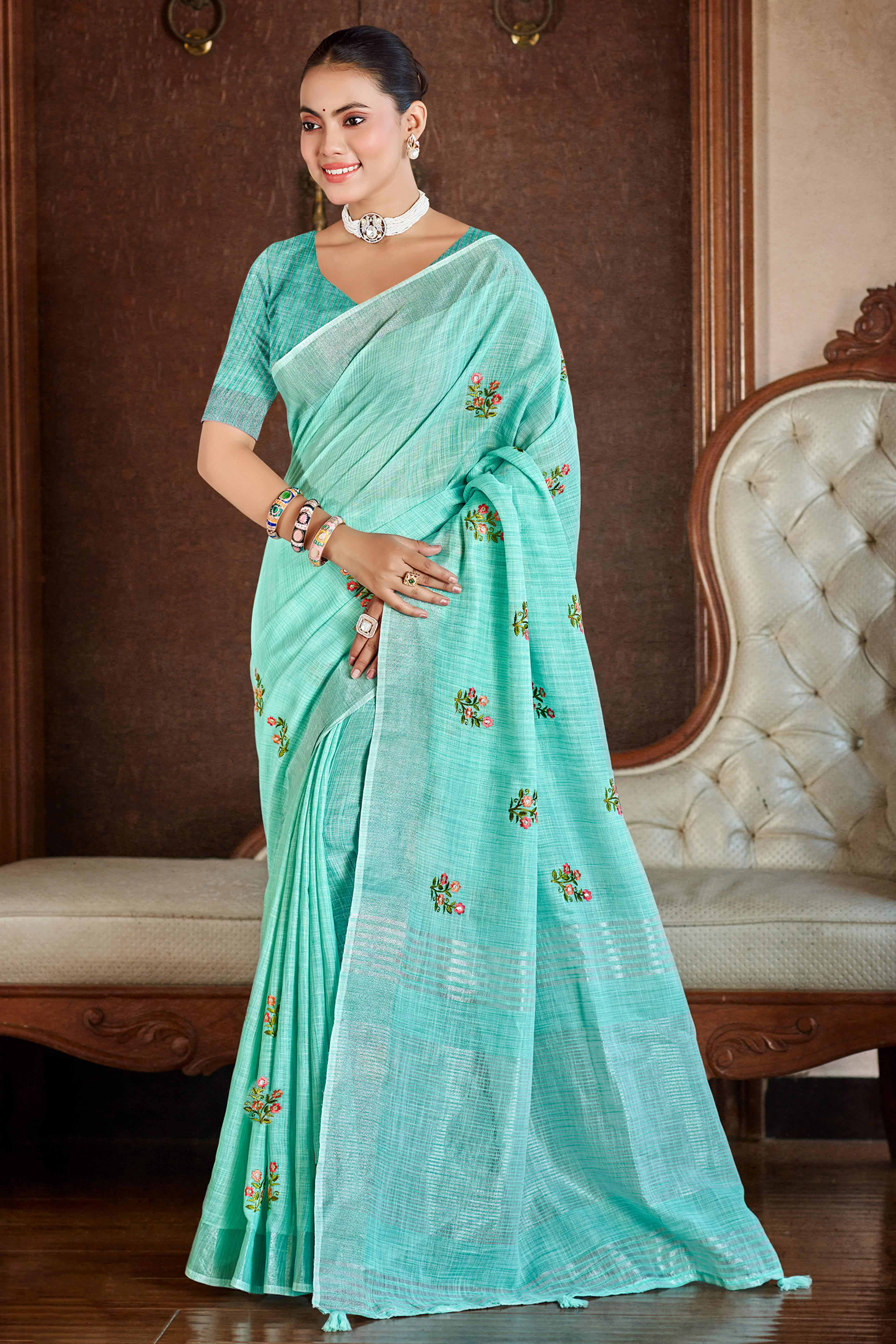 Turquoise Embroidered Linen Saree with Floral Motifs in Woven Fabric