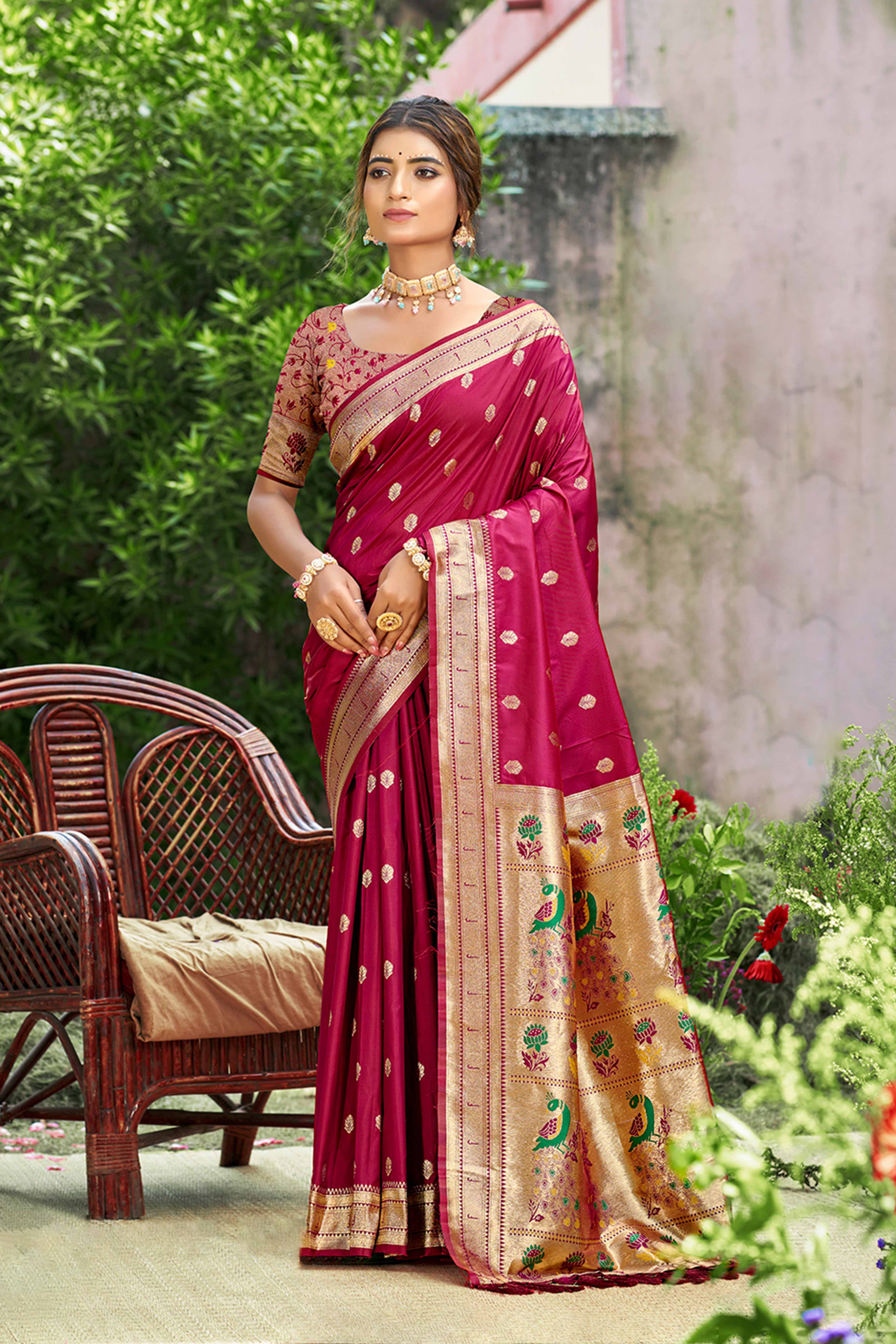 Deep Magenta Zari Weaving Silk Blend Saree Adorned With Peacock Motif Pallu & Graceful Tassel