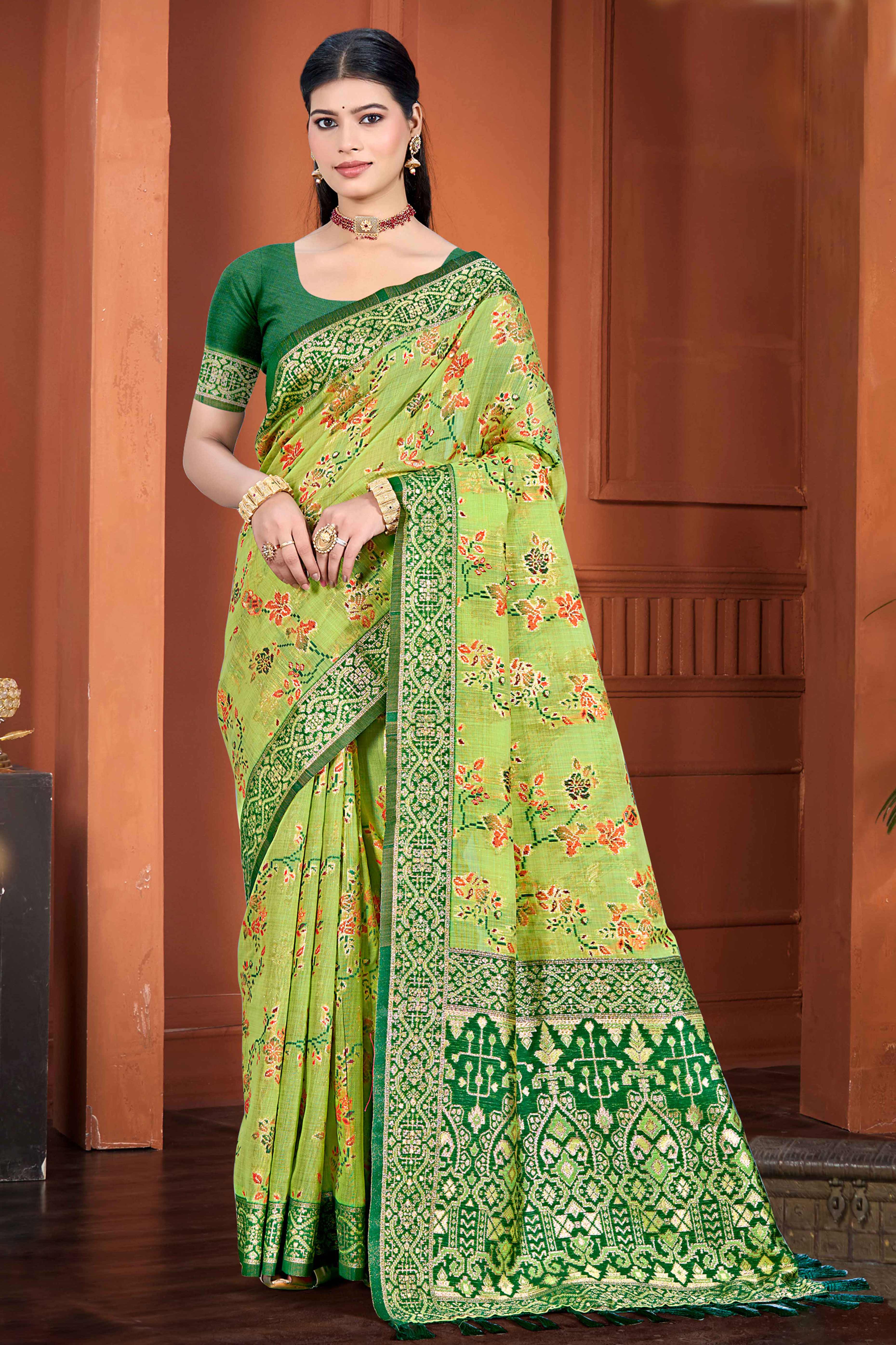 Stunning Green Floral Zari Weaving Cotton Silk Meena Saree With Tassel Pallu