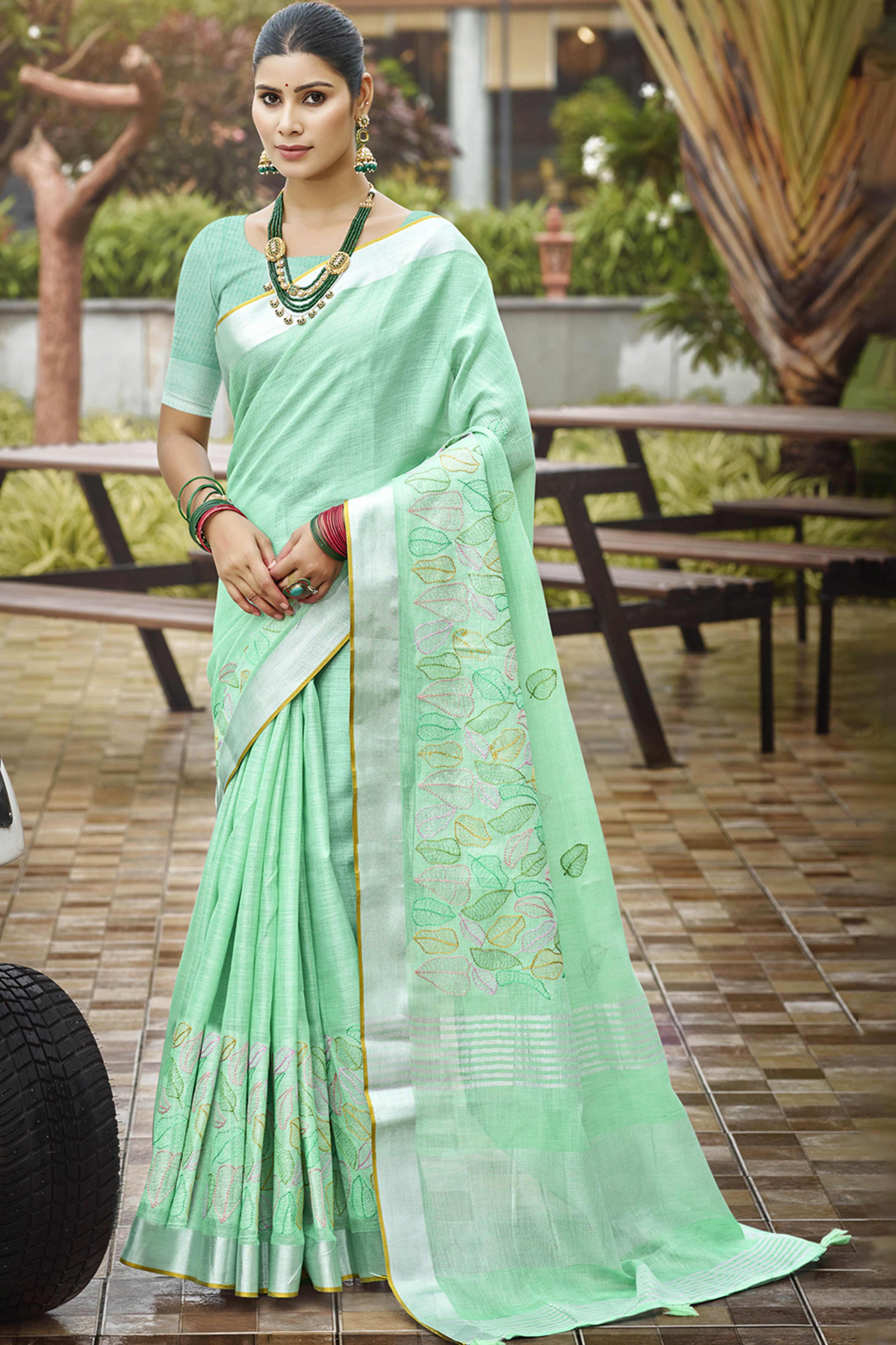 Classic Sea Green Leaf Pattern Thread Embroidery Work Linen Saree With Tassel Pallu